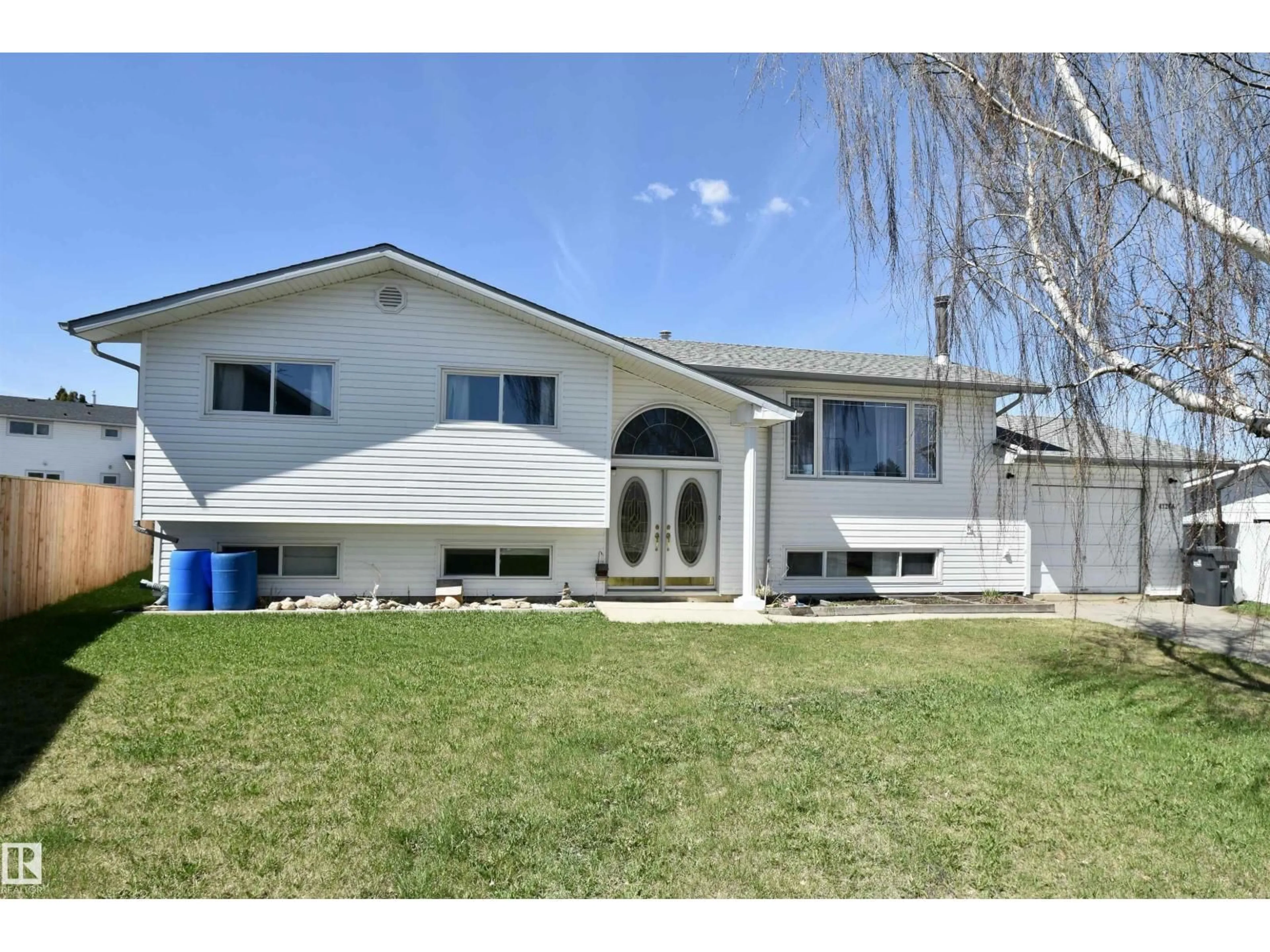 Home with vinyl exterior material, street for 4126A 47 AV, St. Paul Town Alberta T0A3A2