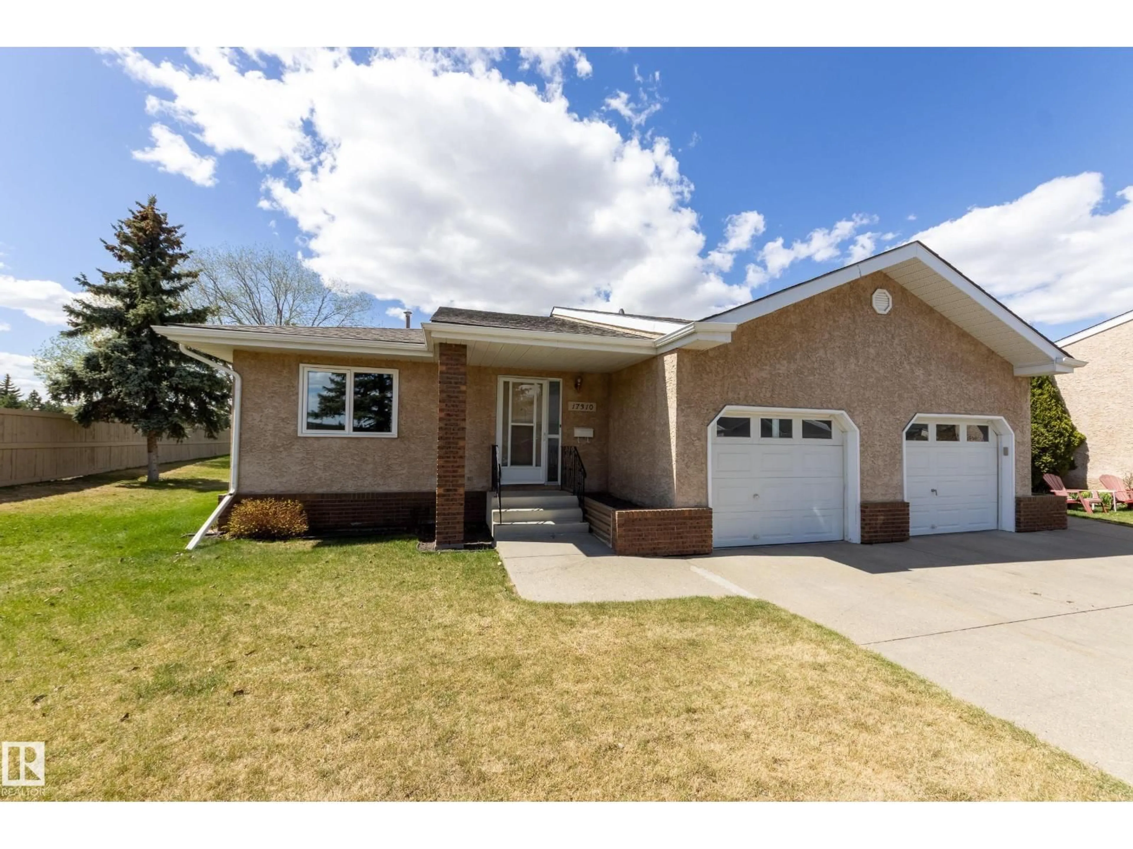 Home with vinyl exterior material, street for 17310 CALLINGWOOD RD, Edmonton Alberta T5T5P1