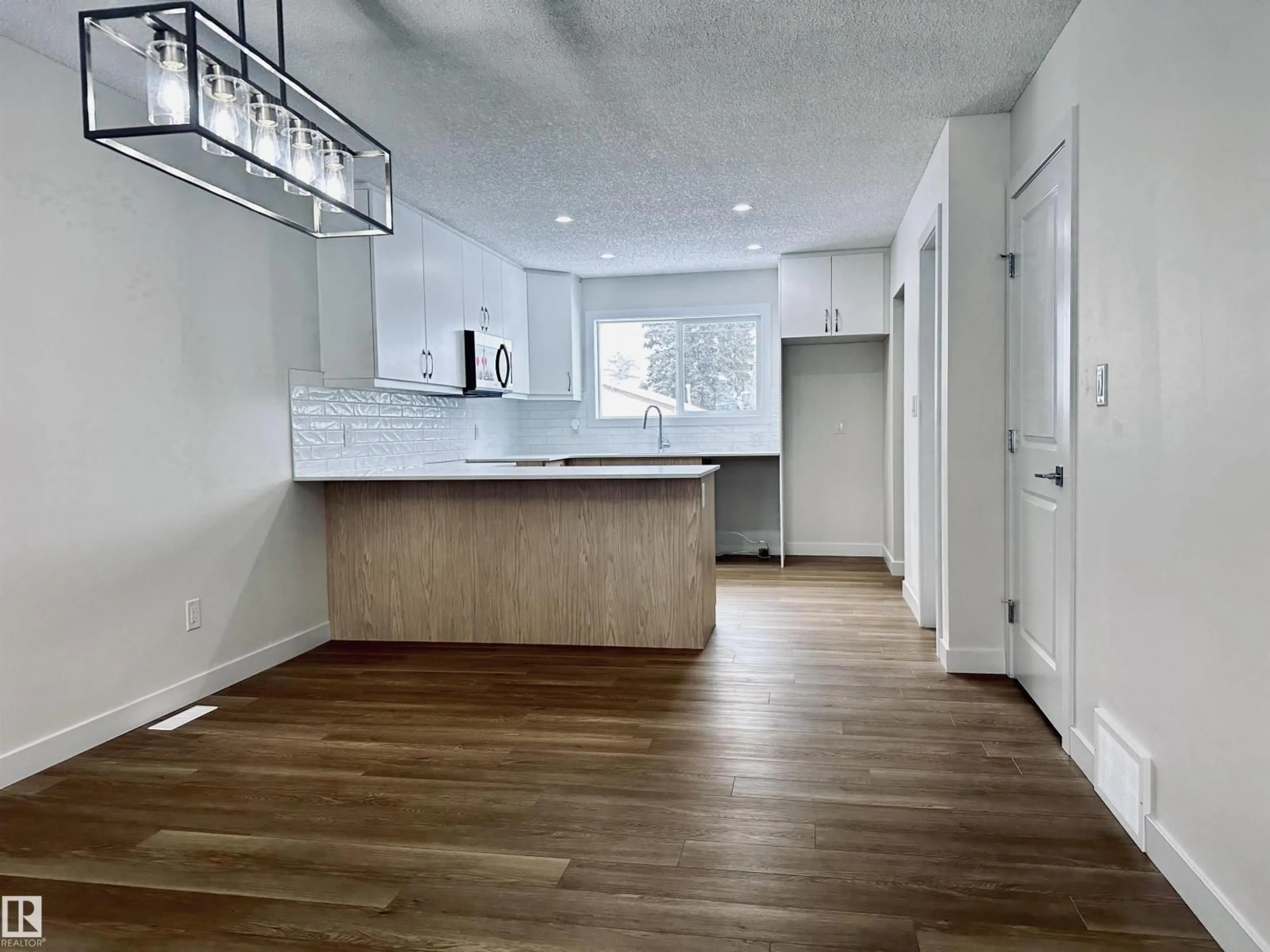 Open concept kitchen, unknown for 4843 115 AV, Edmonton Alberta T5W0W3