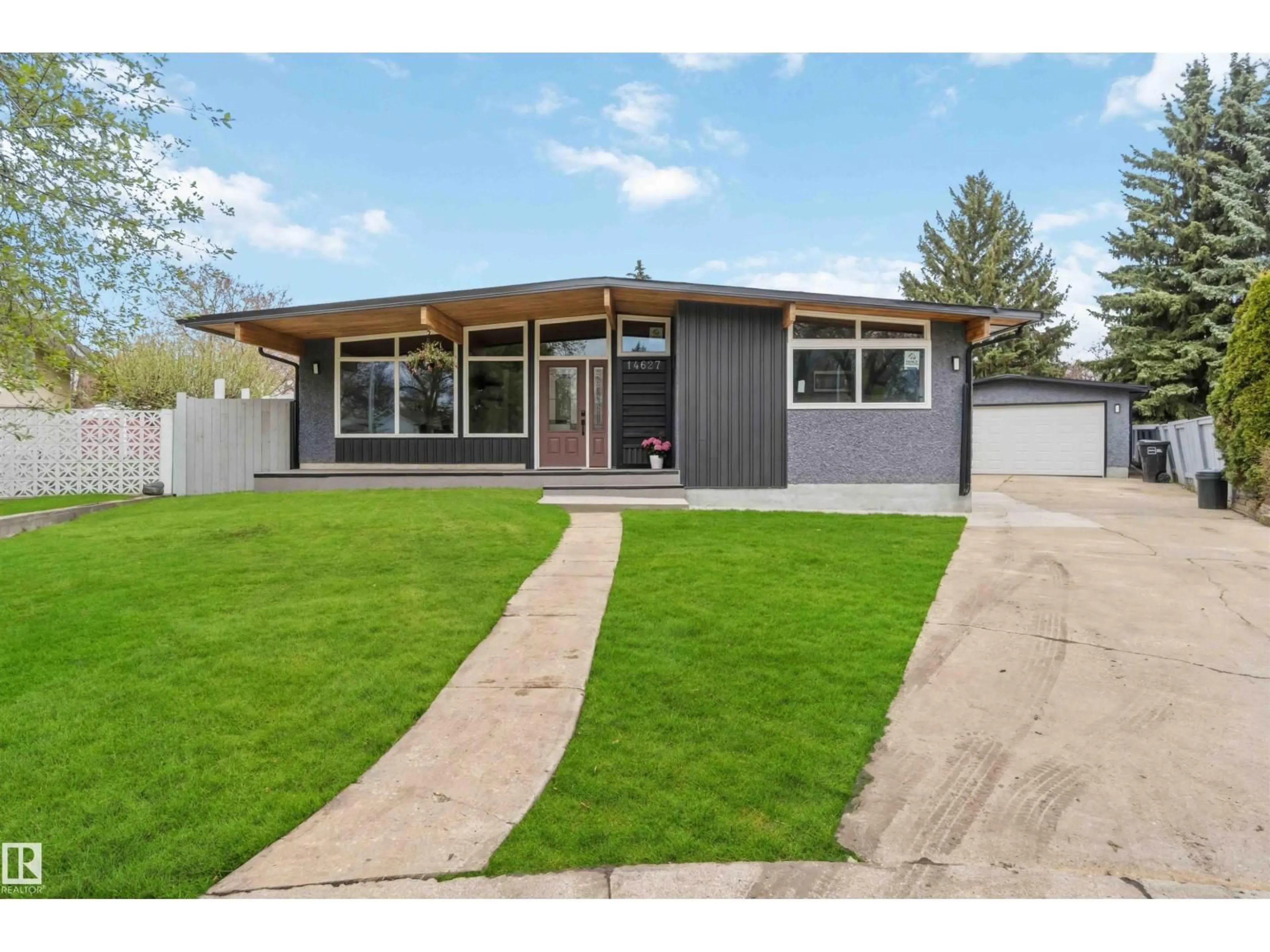Home with vinyl exterior material, street for NW - 14627 60 ST, Edmonton Alberta T5A1Z3