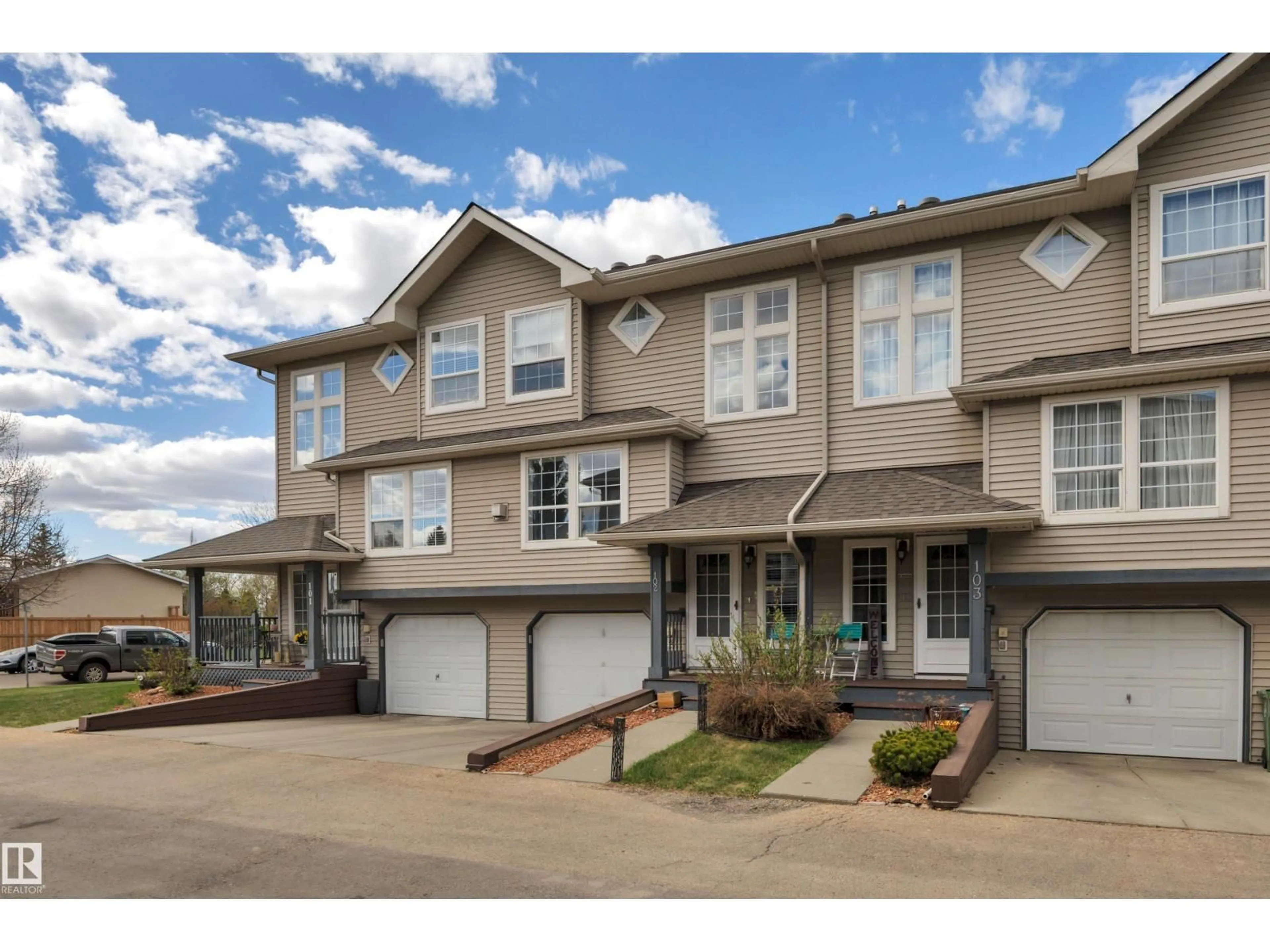 Home with vinyl exterior material, street for #102 - 4415 SOUTH PARK DR, Leduc Alberta T9E8E7