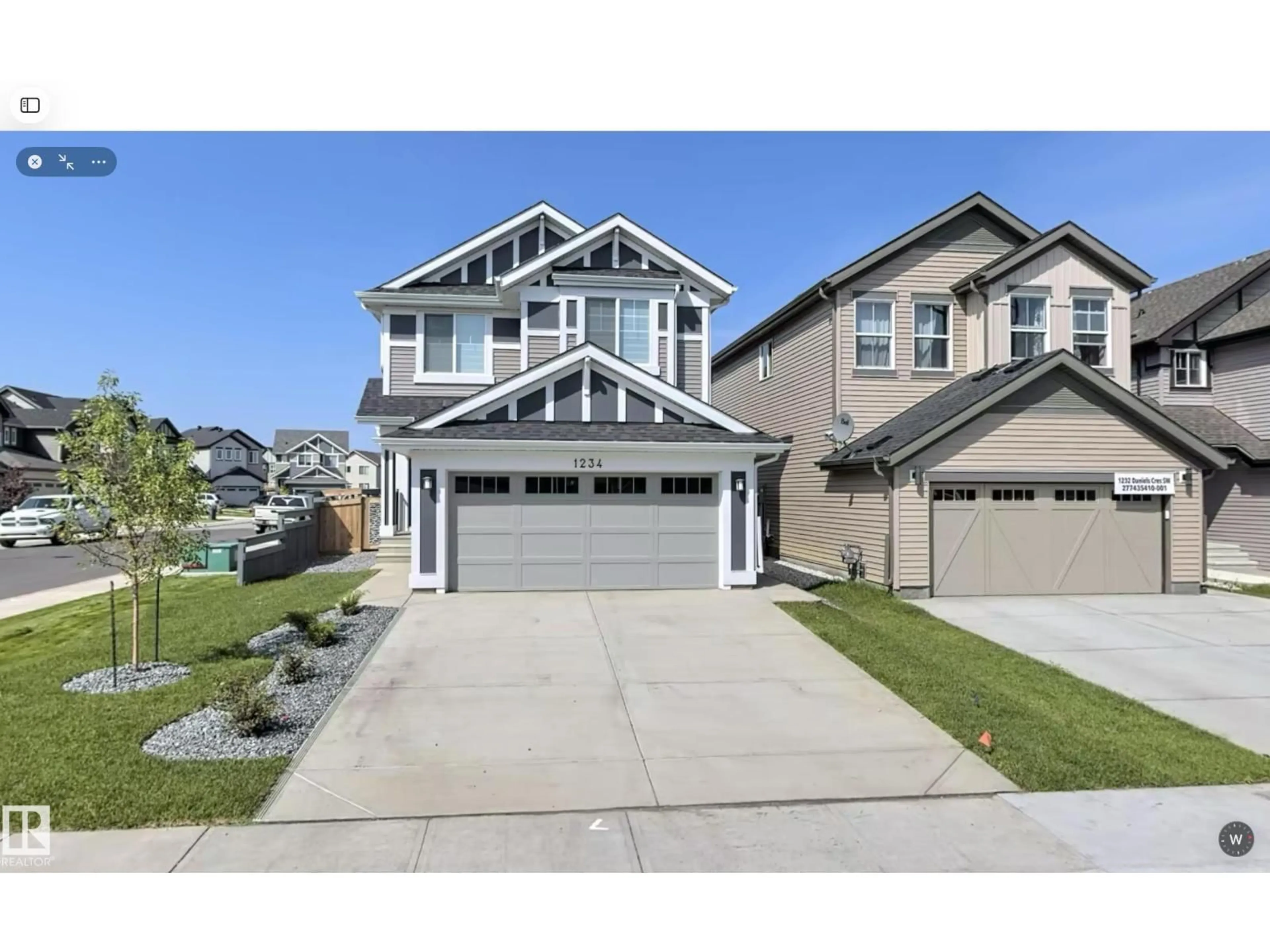 Home with vinyl exterior material, street for 1234 DANIELS CR, Edmonton Alberta T6W3V6