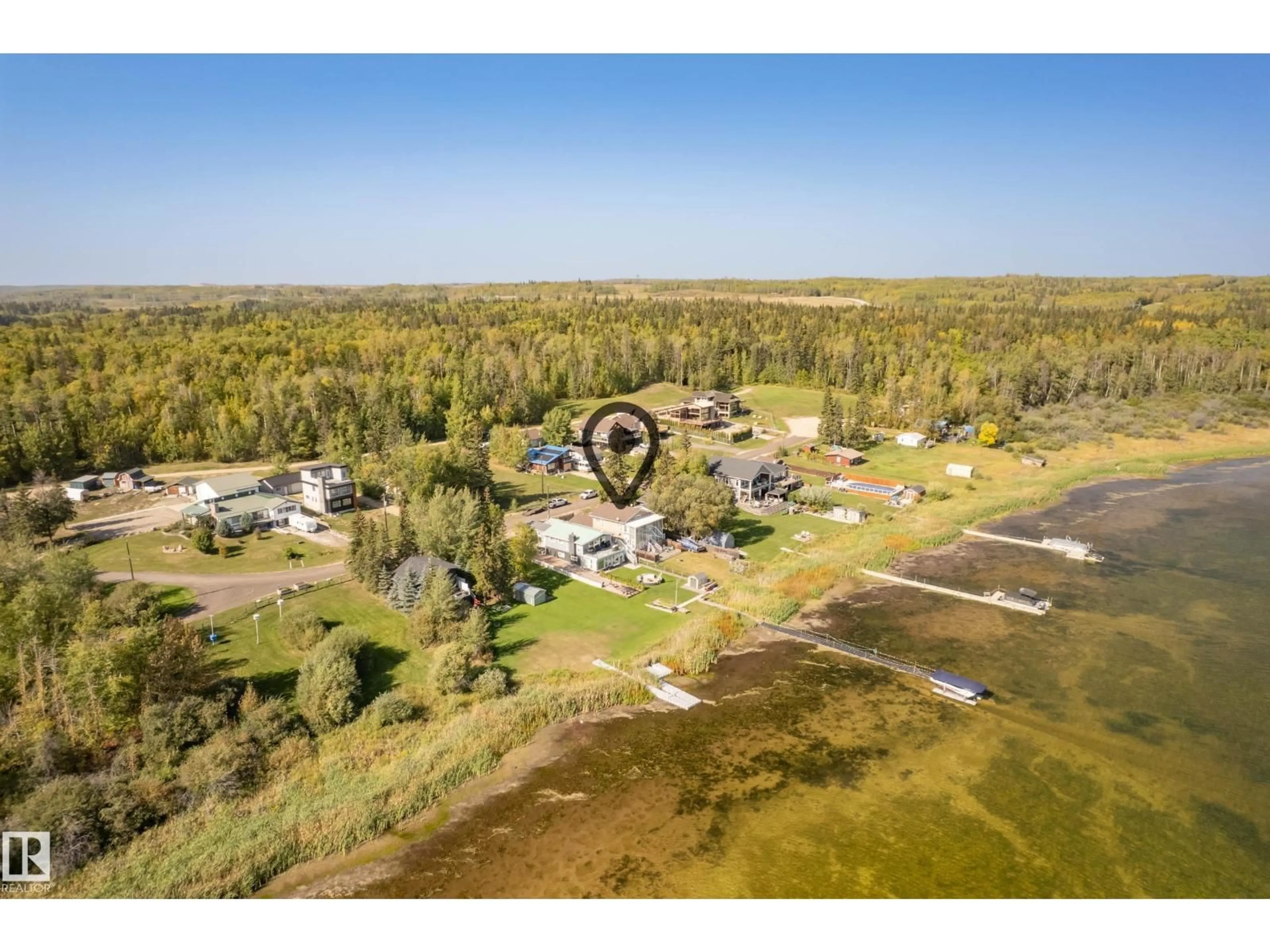 A pic from outside/outdoor area/front of a property/back of a property/a pic from drone, water/lake/river/ocean view for 104 BAYVIEW DR, Rural Parkland County Alberta T0E2K0