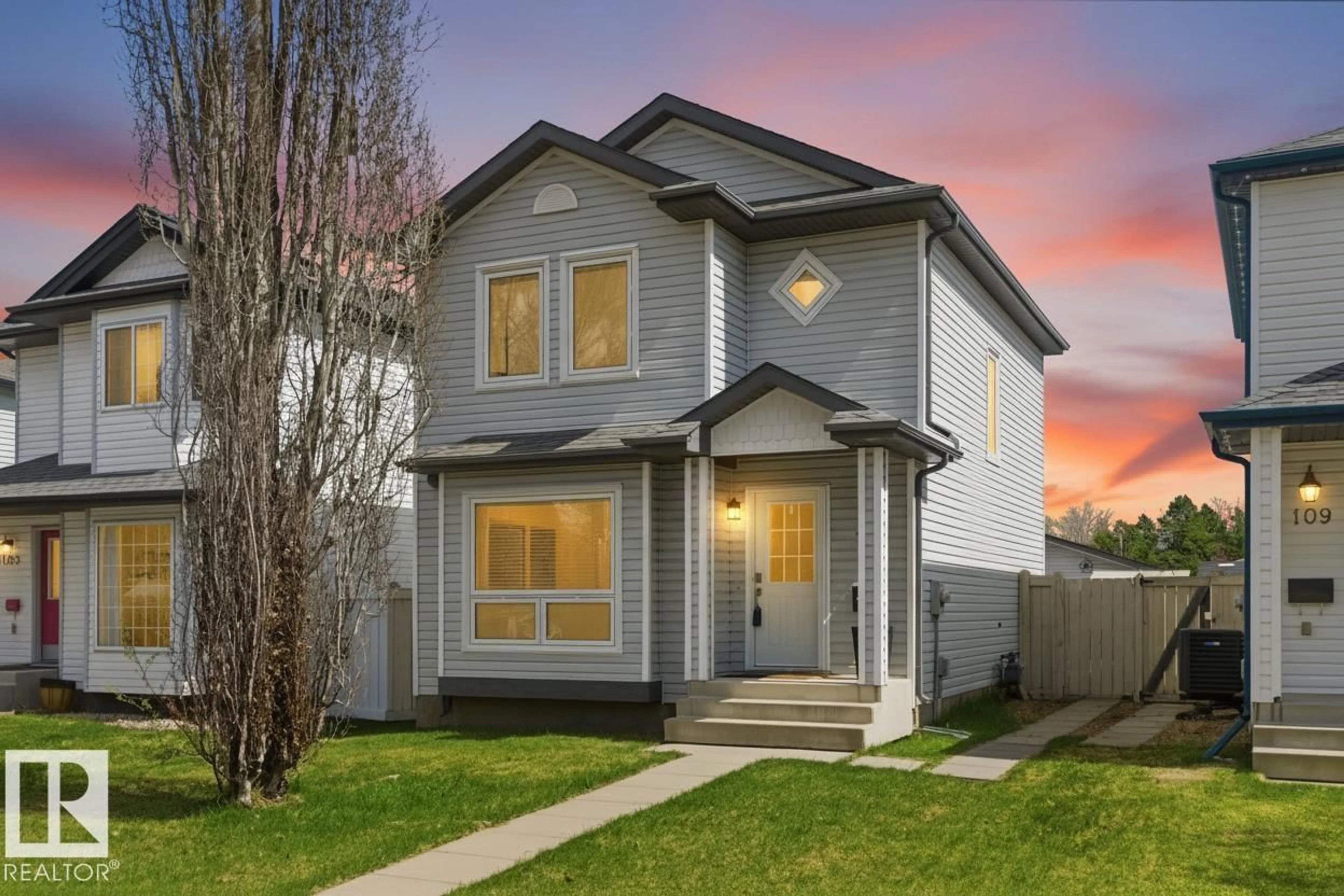 Home with vinyl exterior material, street for 107 MICHIGAN ST, Devon Alberta T9G2H4