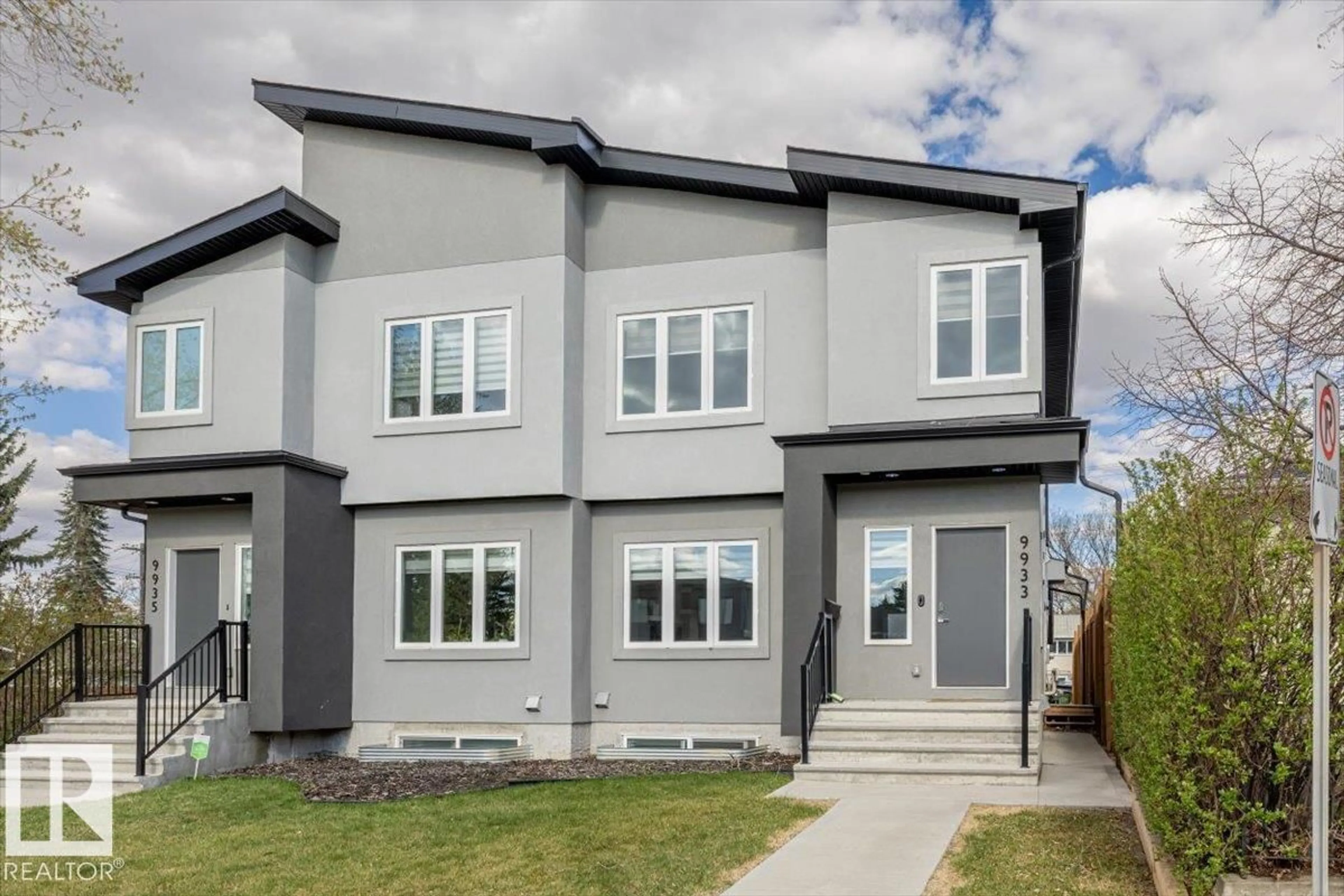 Home with vinyl exterior material, street for 9933 79 ST, Edmonton Alberta T6A3G2