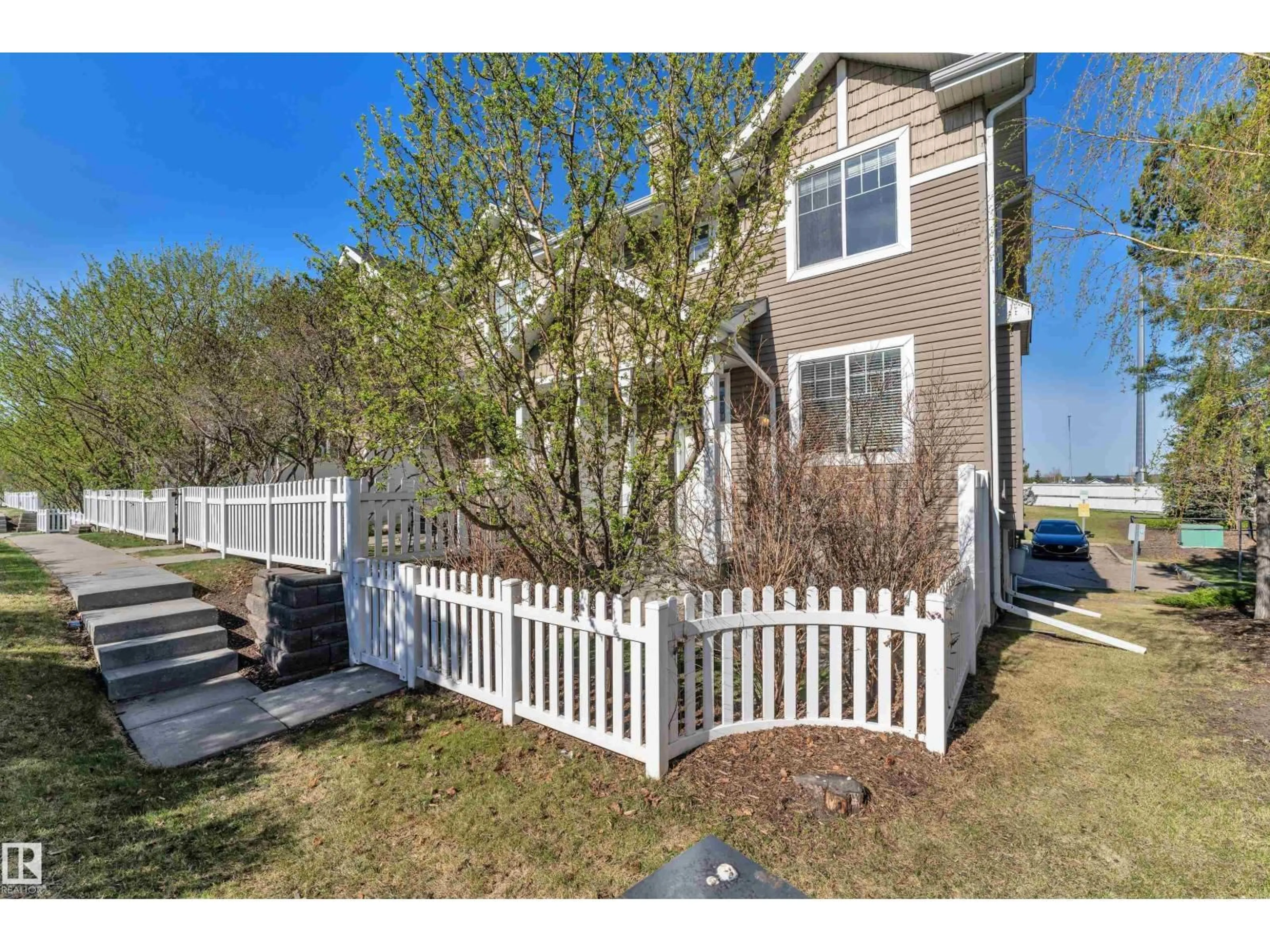 A pic from outside/outdoor area/front of a property/back of a property/a pic from drone, street for 48 3075 TRELLE CR NW, Edmonton Alberta T6R3V5