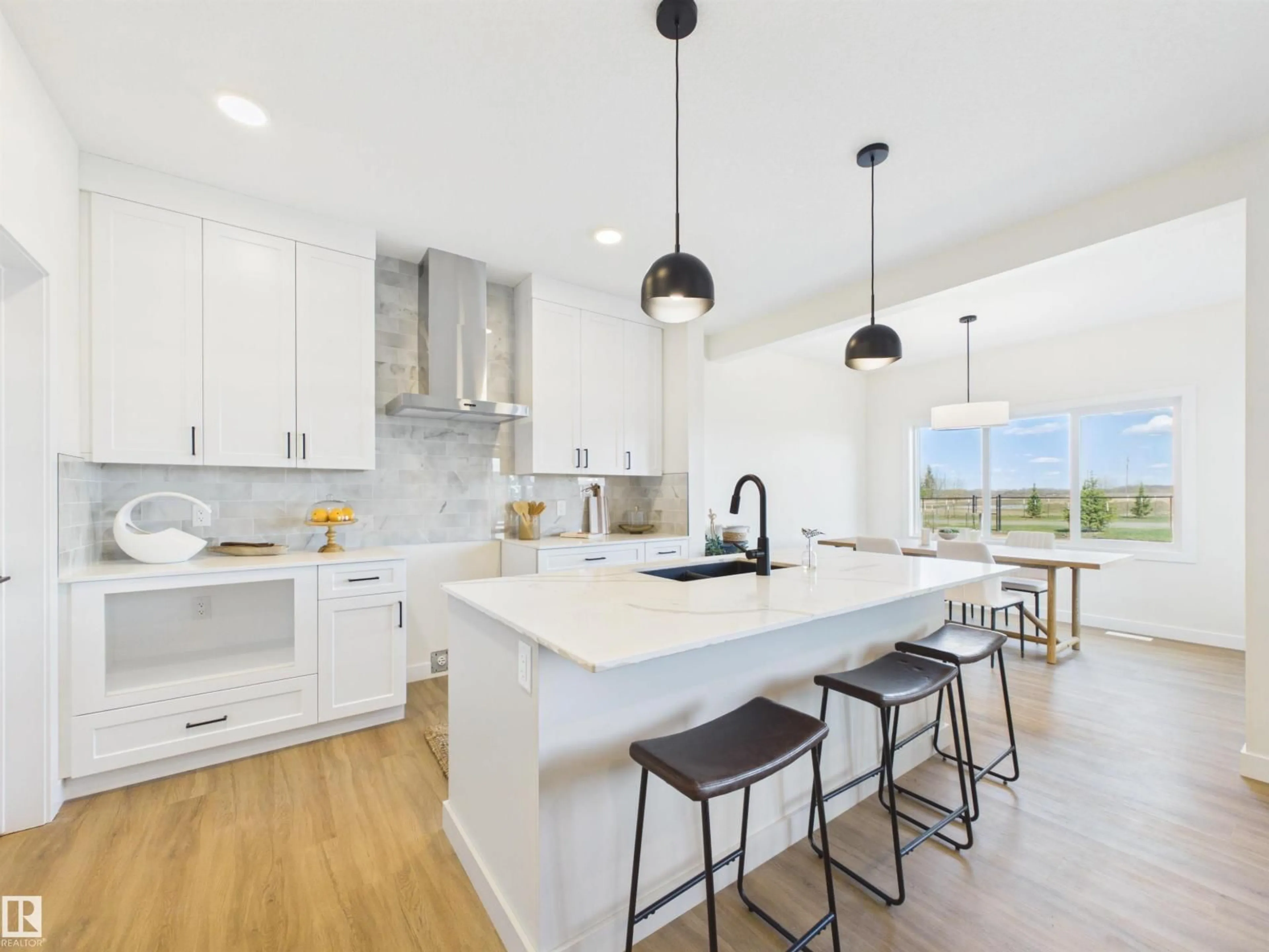 Open concept kitchen, ceramic/tile floor for 53 SUMAC CL, Fort Saskatchewan Alberta T8L0Z9