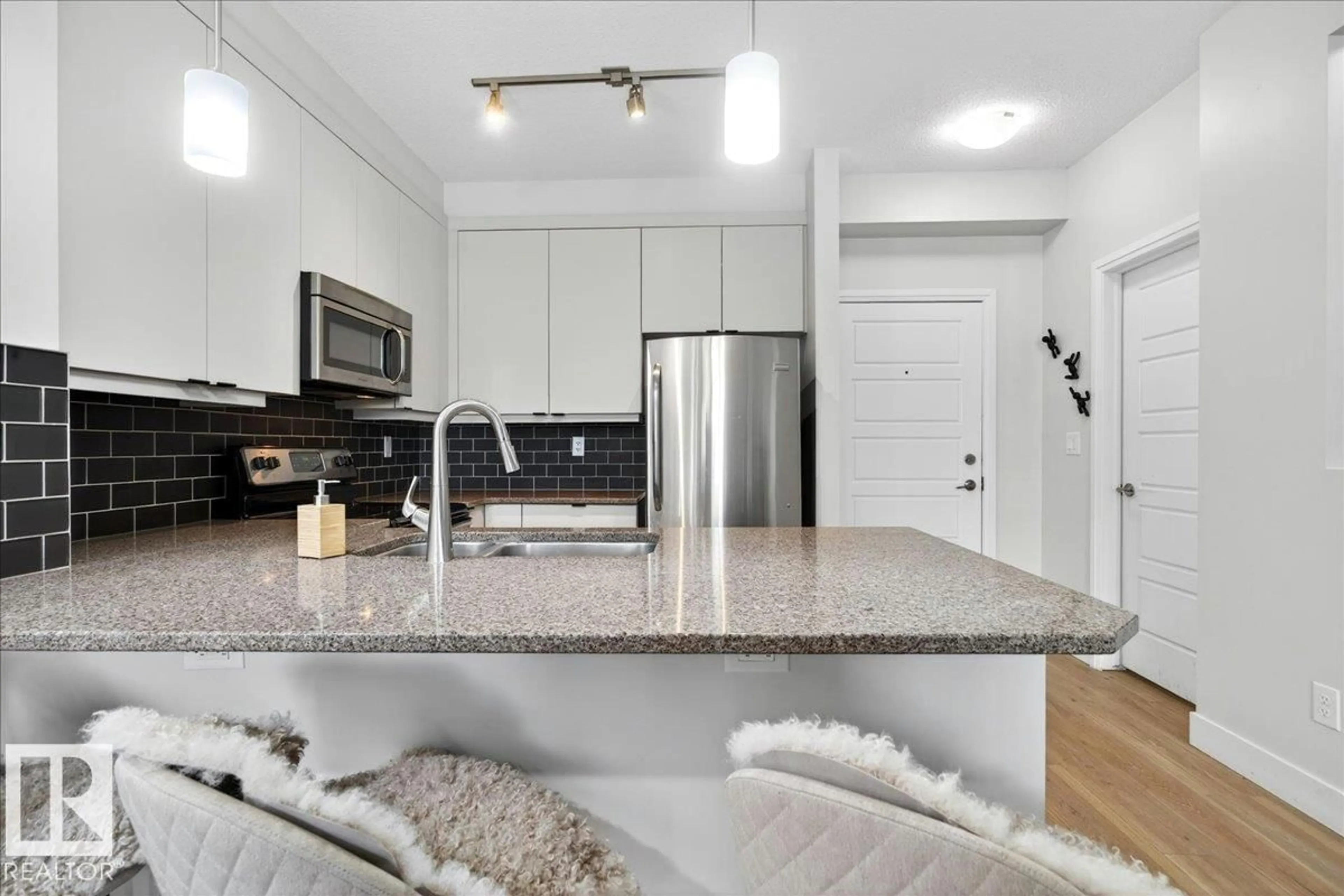 Open concept kitchen, unknown for #103 - 2590 ANDERSON WY, Edmonton Alberta T6W0R2