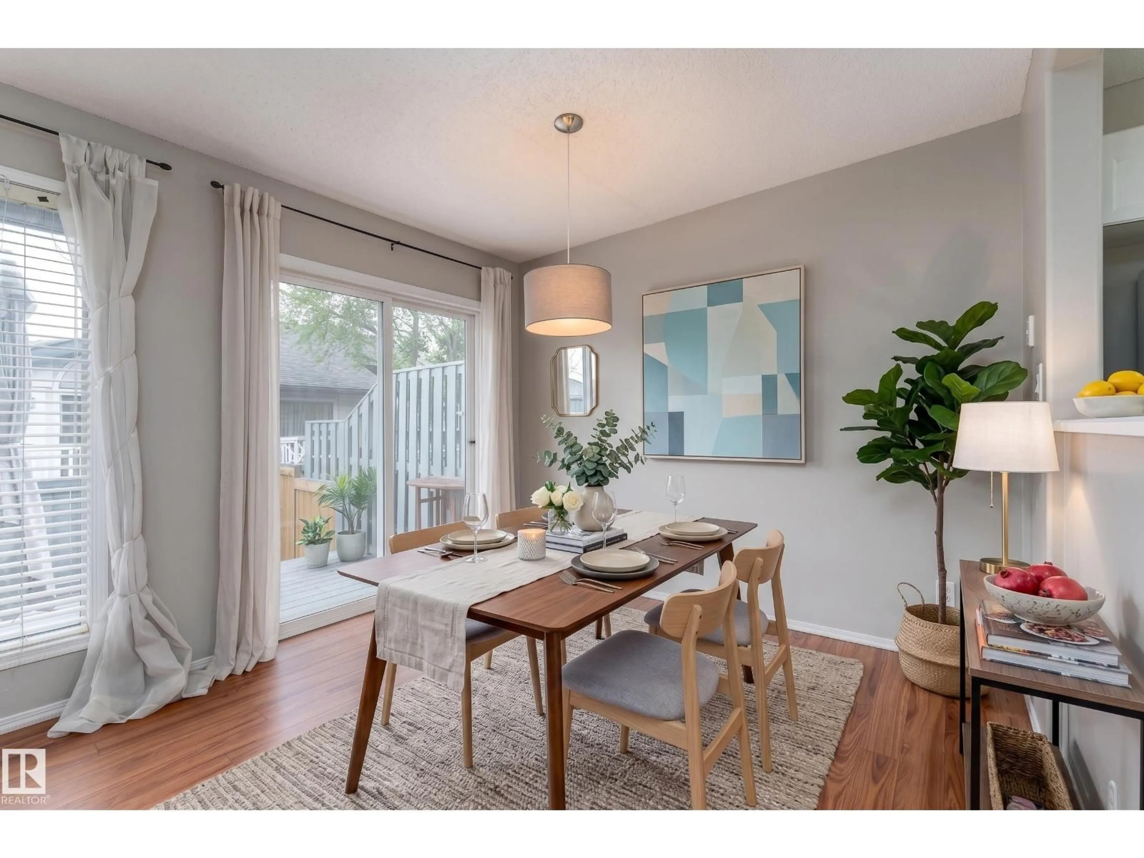 Dining room, wood/laminate floor for 121 BULYEA RD, Edmonton Alberta T6R2M9