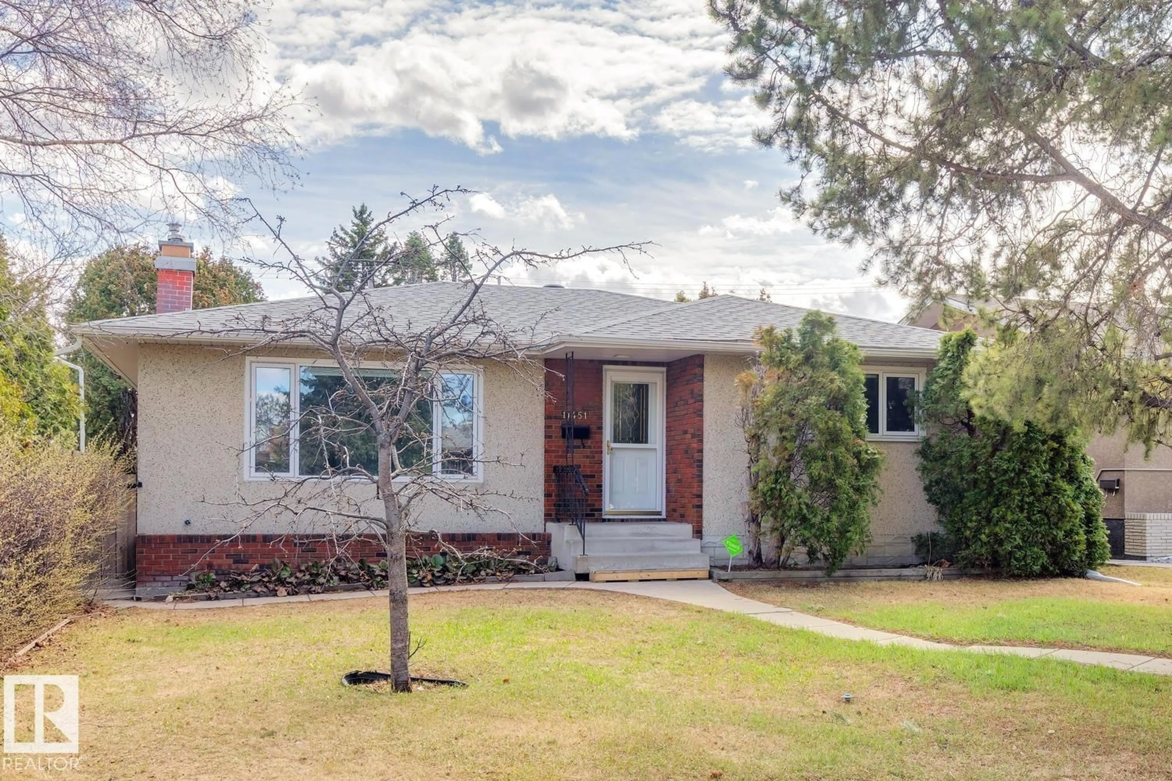 Home with brick exterior material, street for 11451 48 AV, Edmonton Alberta T6H0C9