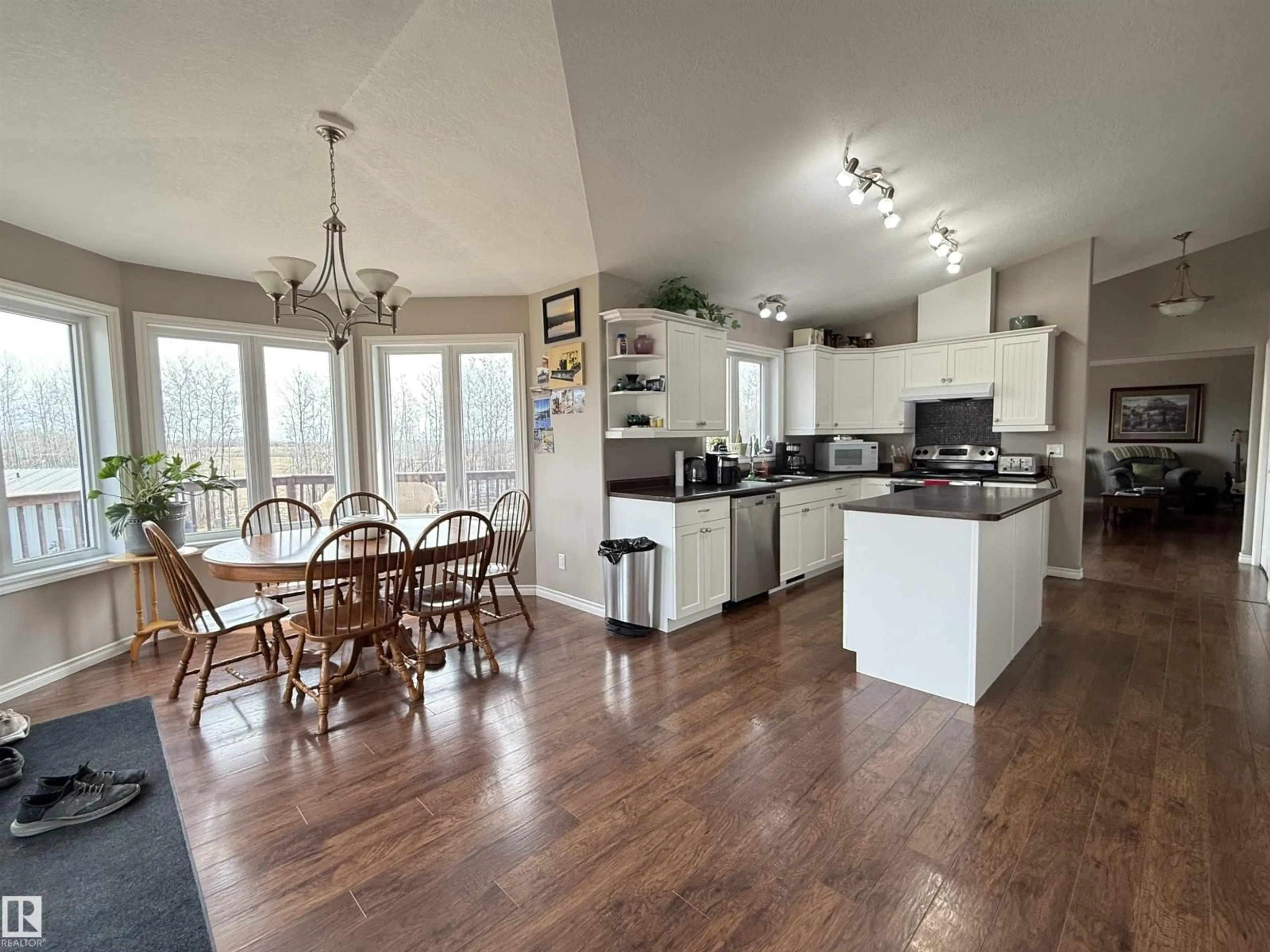 Open concept kitchen, wood/laminate floor for 15113 TOWNSHIP ROAD 670, Rural Lac La Biche County Alberta T0A2C0
