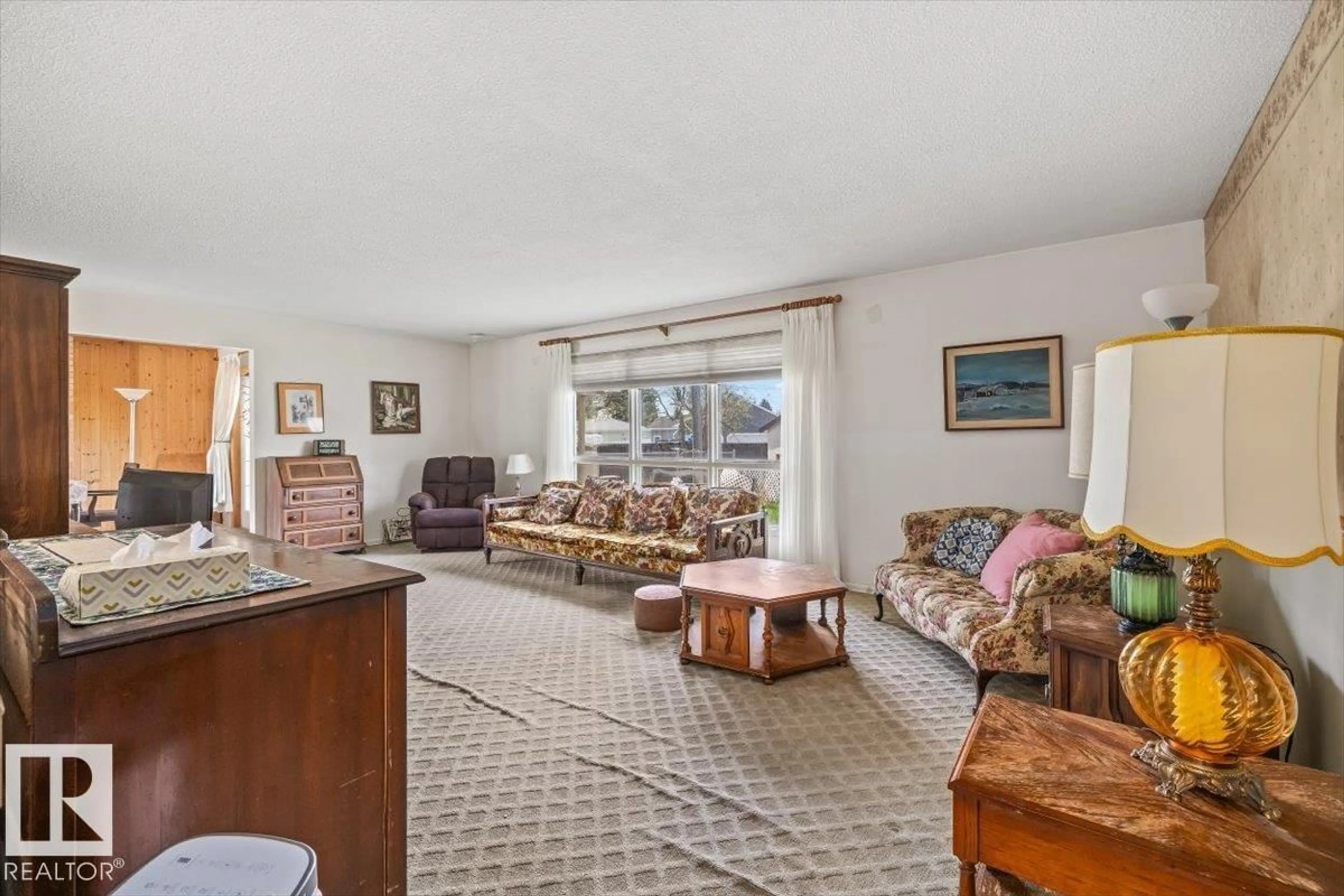 Living room with furniture, unknown for 9732 64 ST, Edmonton Alberta T6B1R3