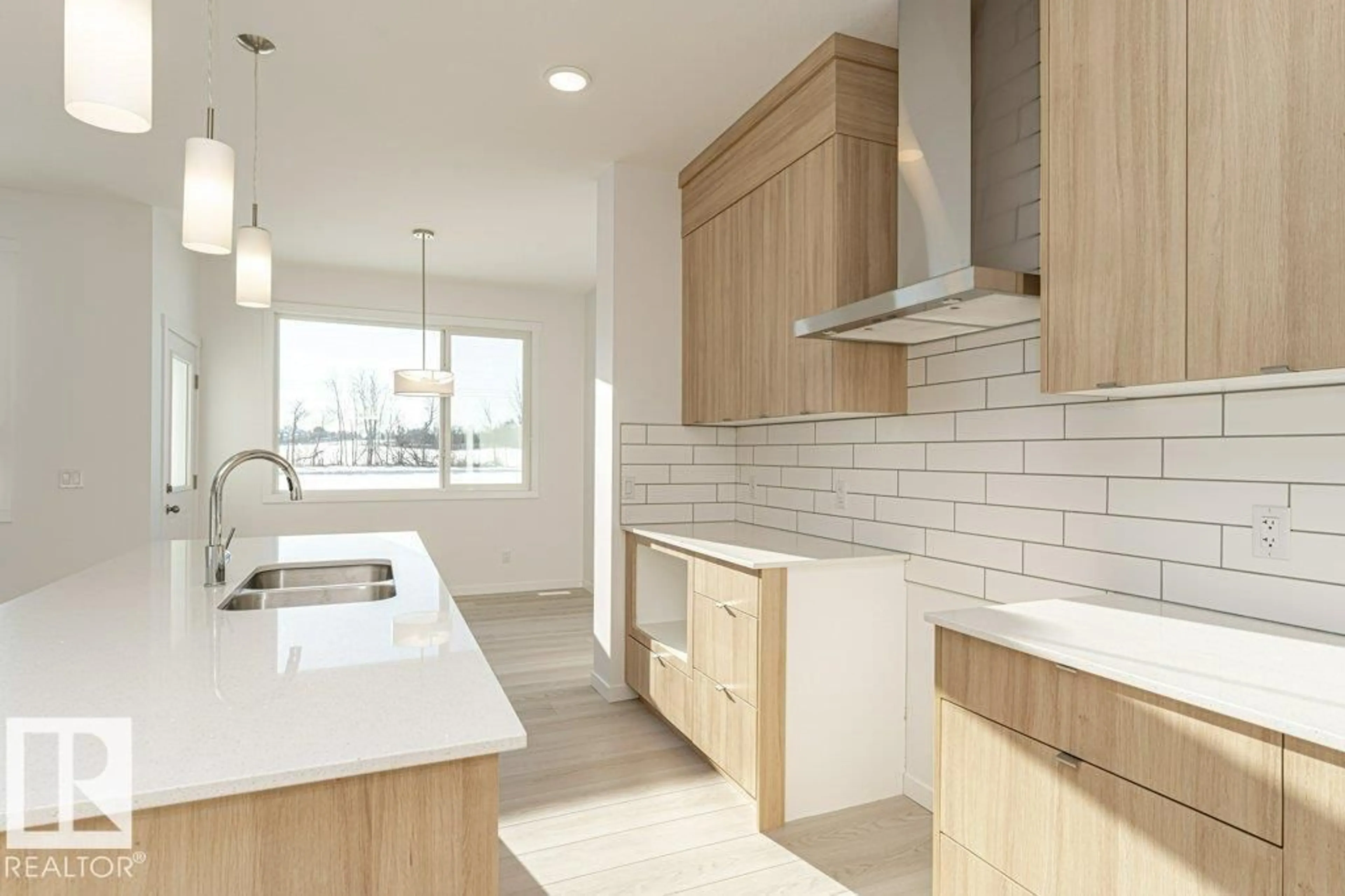 Open concept kitchen, ceramic/tile floor for 2312 160 ST, Edmonton Alberta T6W5X2