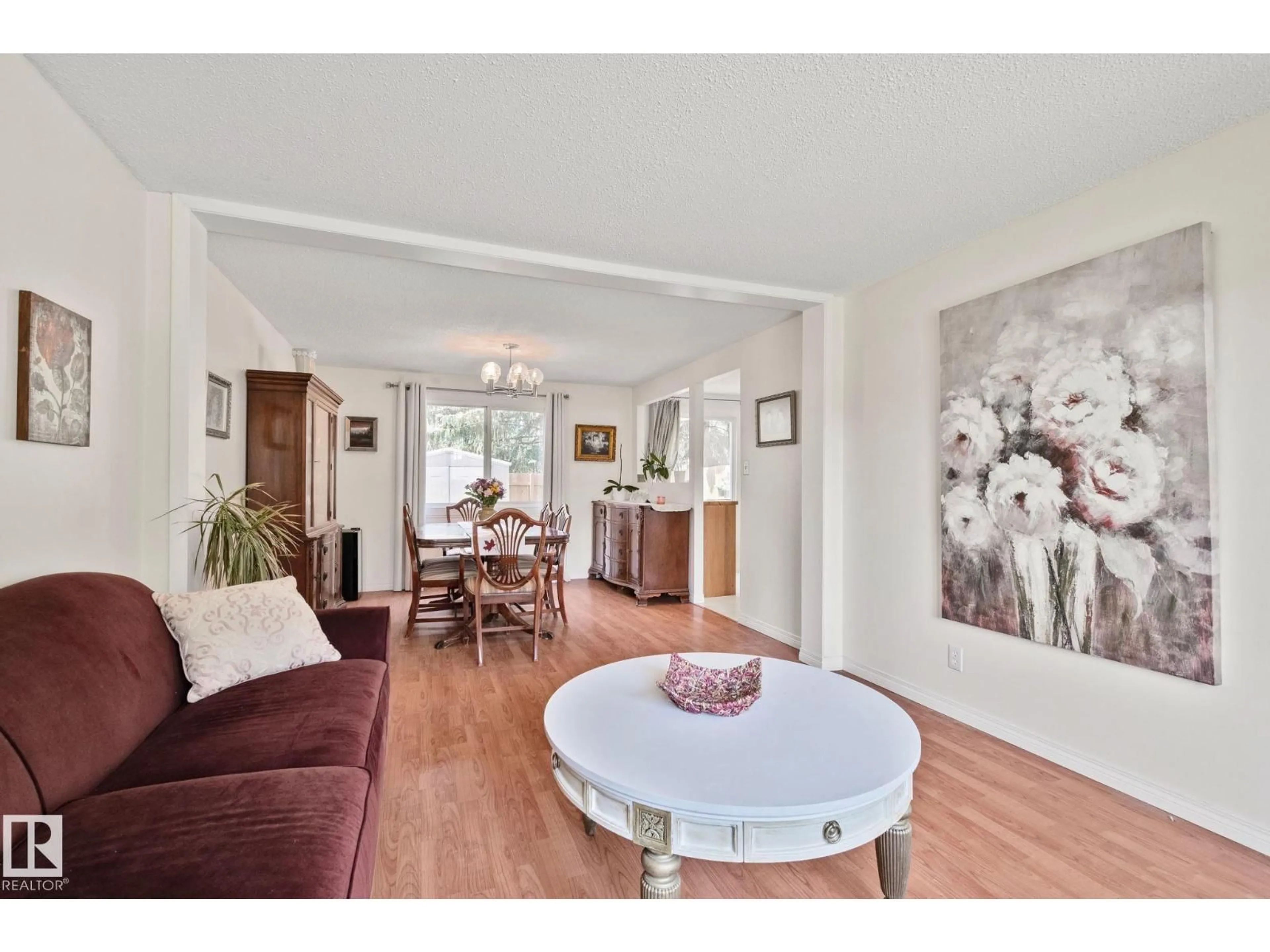 Living room with furniture, wood/laminate floor for 97 RIDGEWOOD, St. Albert Alberta T8A0E9