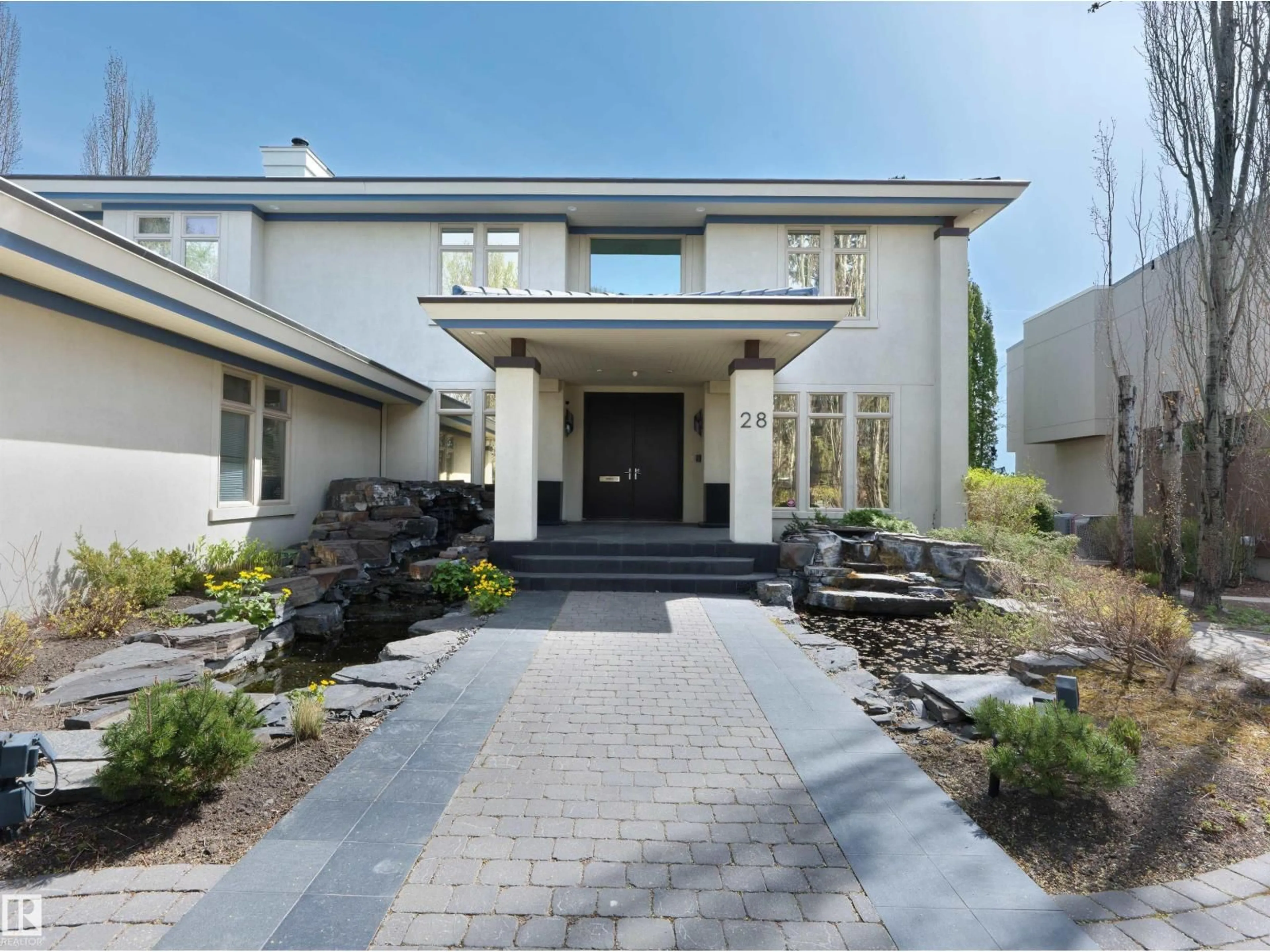Home with brick exterior material, street for 28 RIVERSIDE CR, Edmonton Alberta T5N3M5