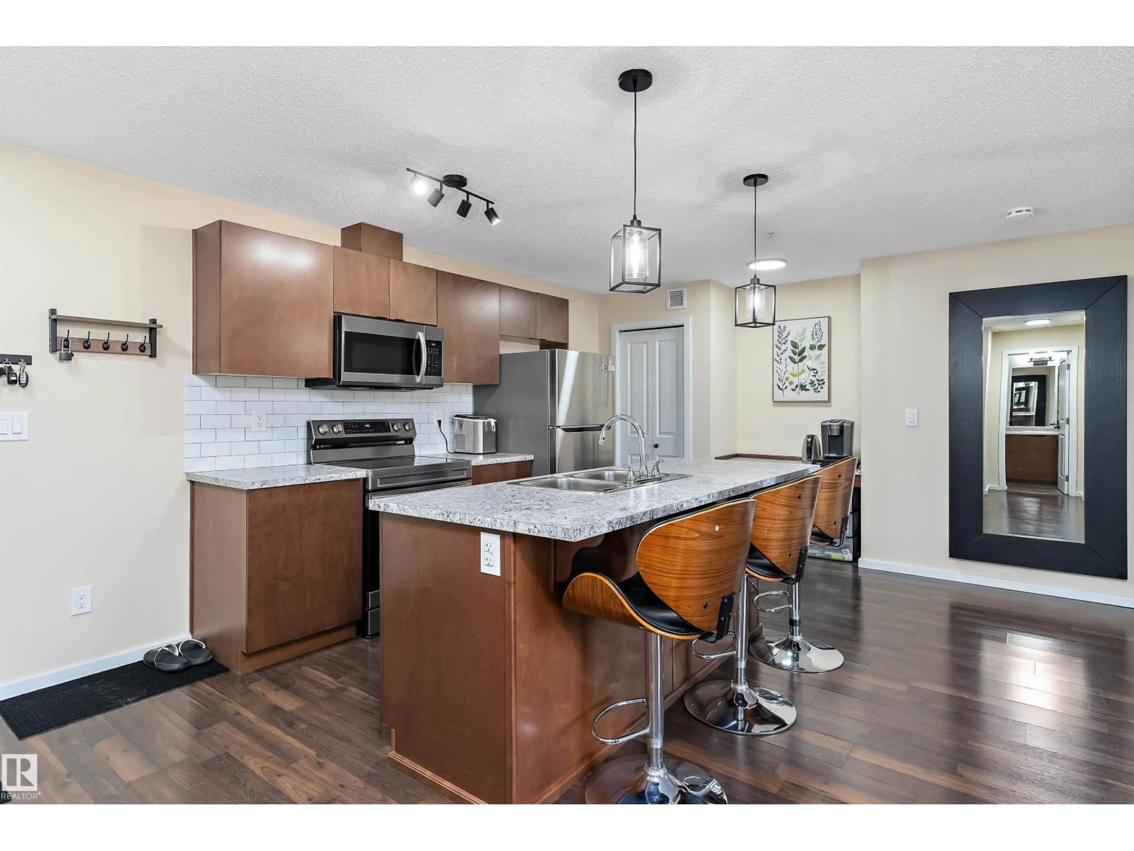 Open concept kitchen, unknown for 122 3357 16A AVE NW, Edmonton Alberta T5T1W1