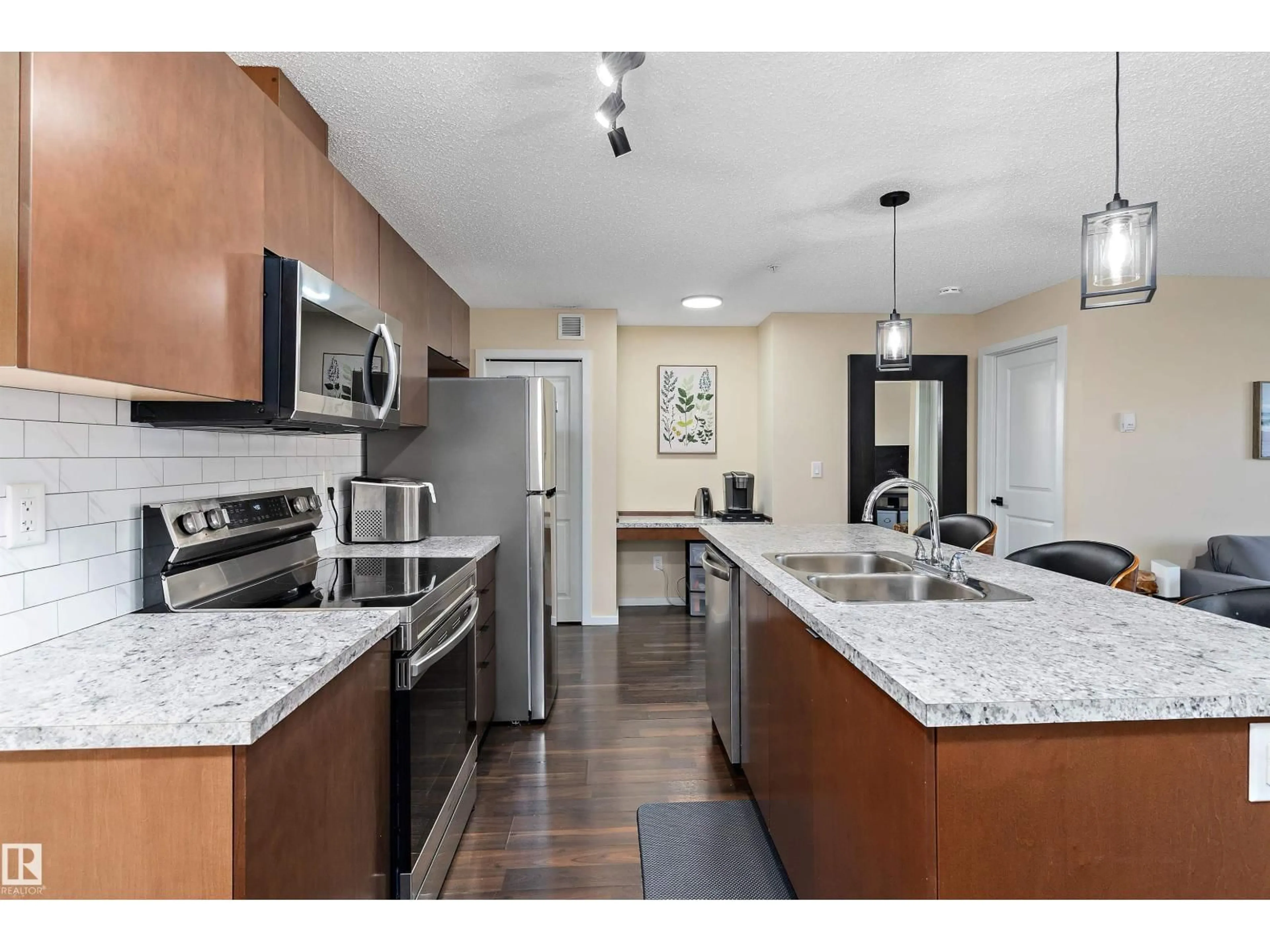 Open concept kitchen, unknown for 122 3357 16A AVE NW, Edmonton Alberta T5T1W1