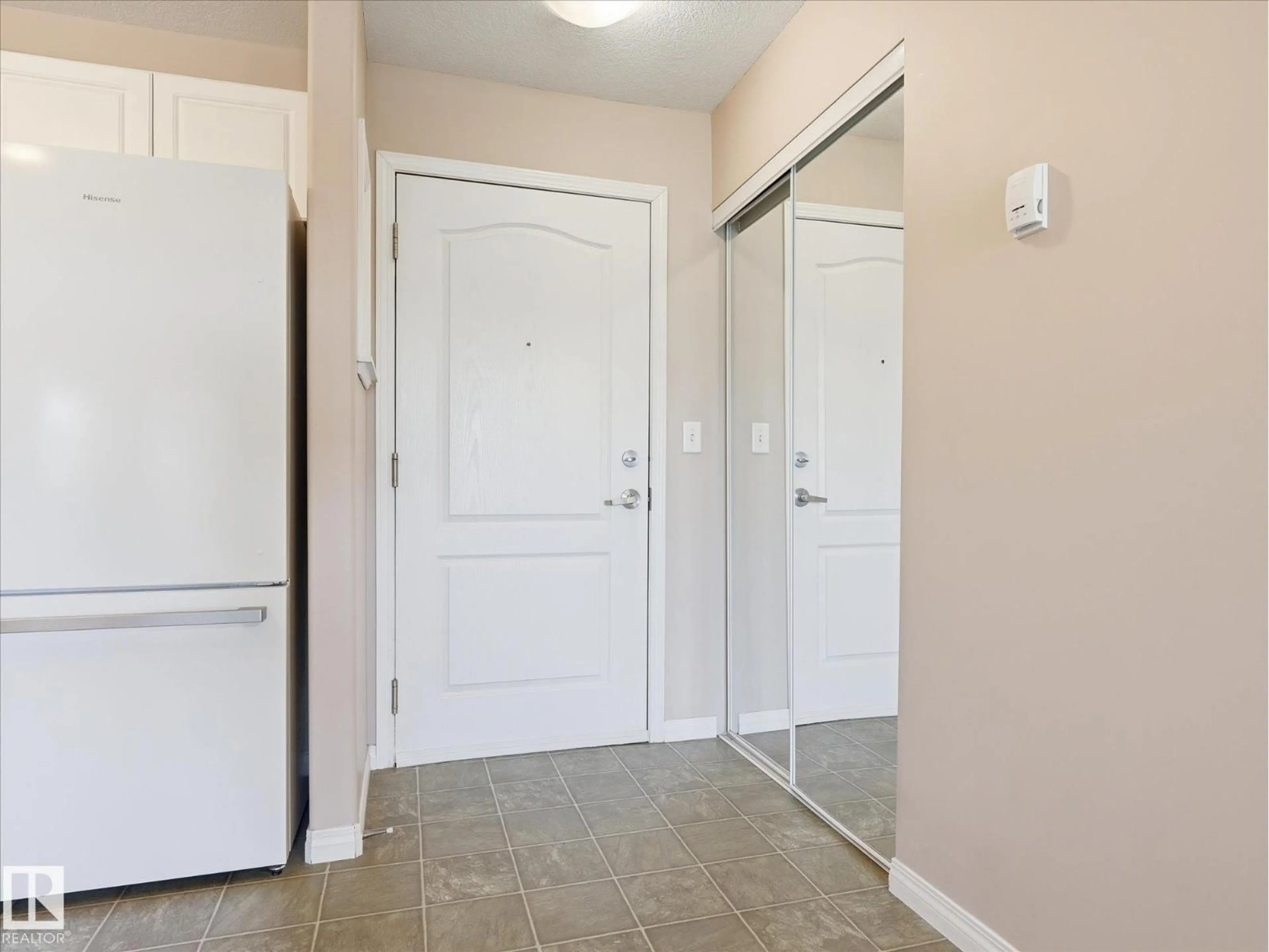 Indoor entryway for 217 - 12550 140 AV, Edmonton Alberta T5X6J4