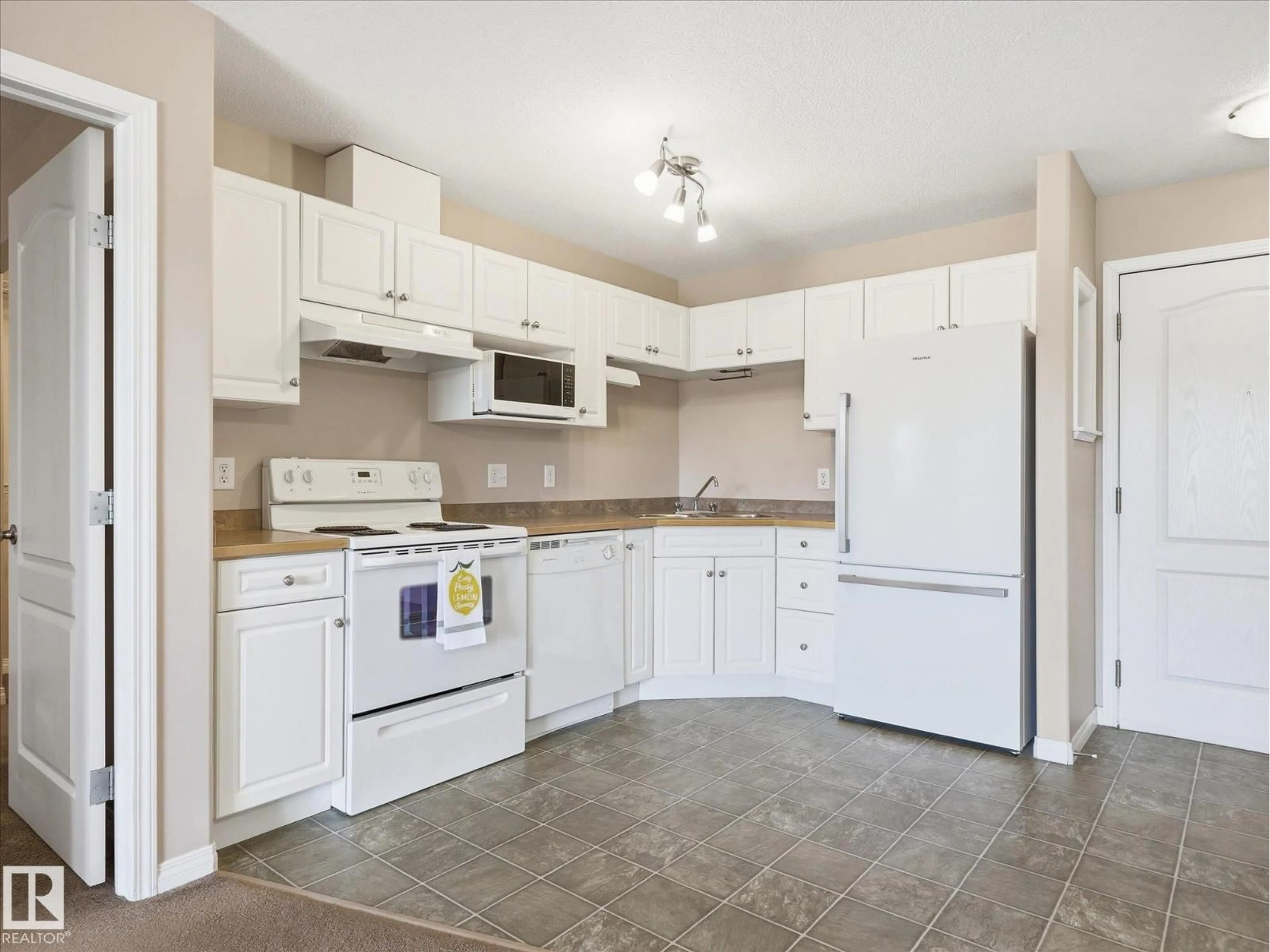 Standard kitchen, ceramic/tile floor for 217 - 12550 140 AV, Edmonton Alberta T5X6J4