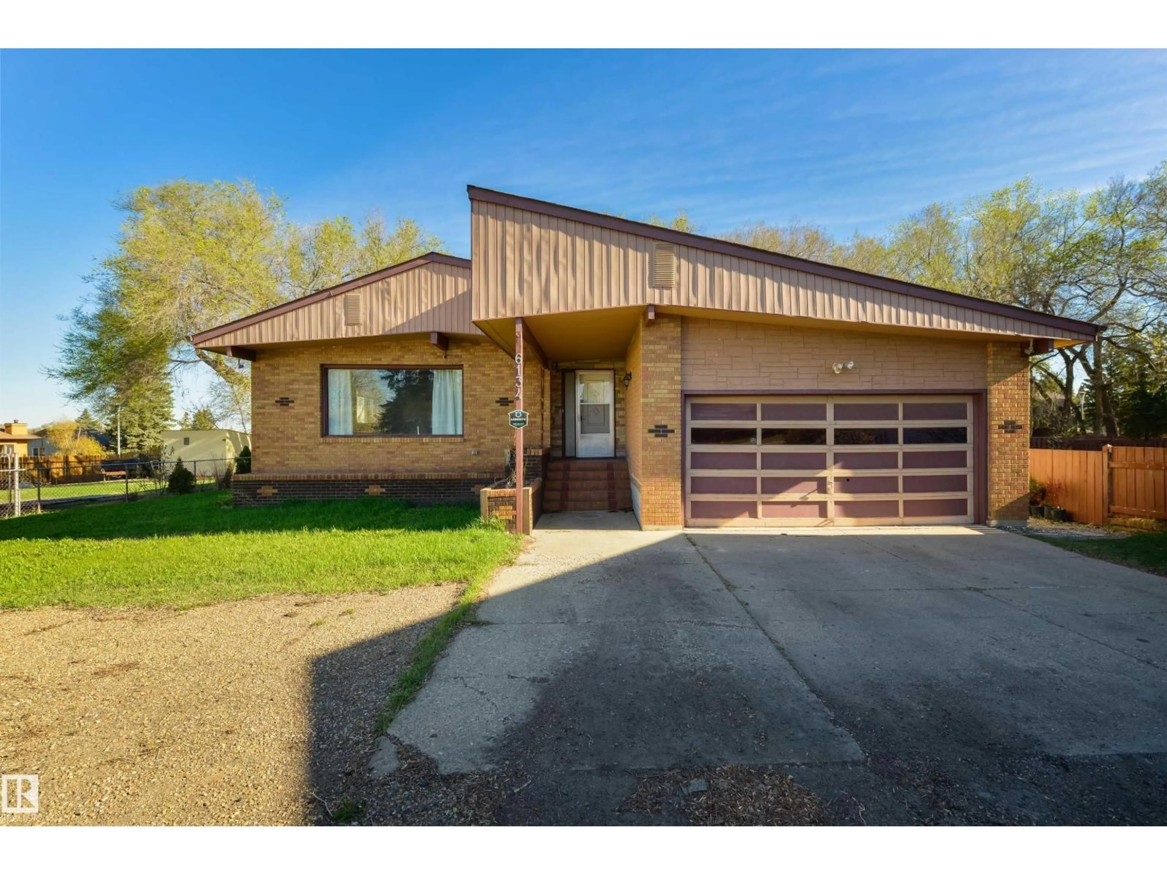 Home with brick exterior material, street for 6134 37A AV, Edmonton Alberta T6L1H4