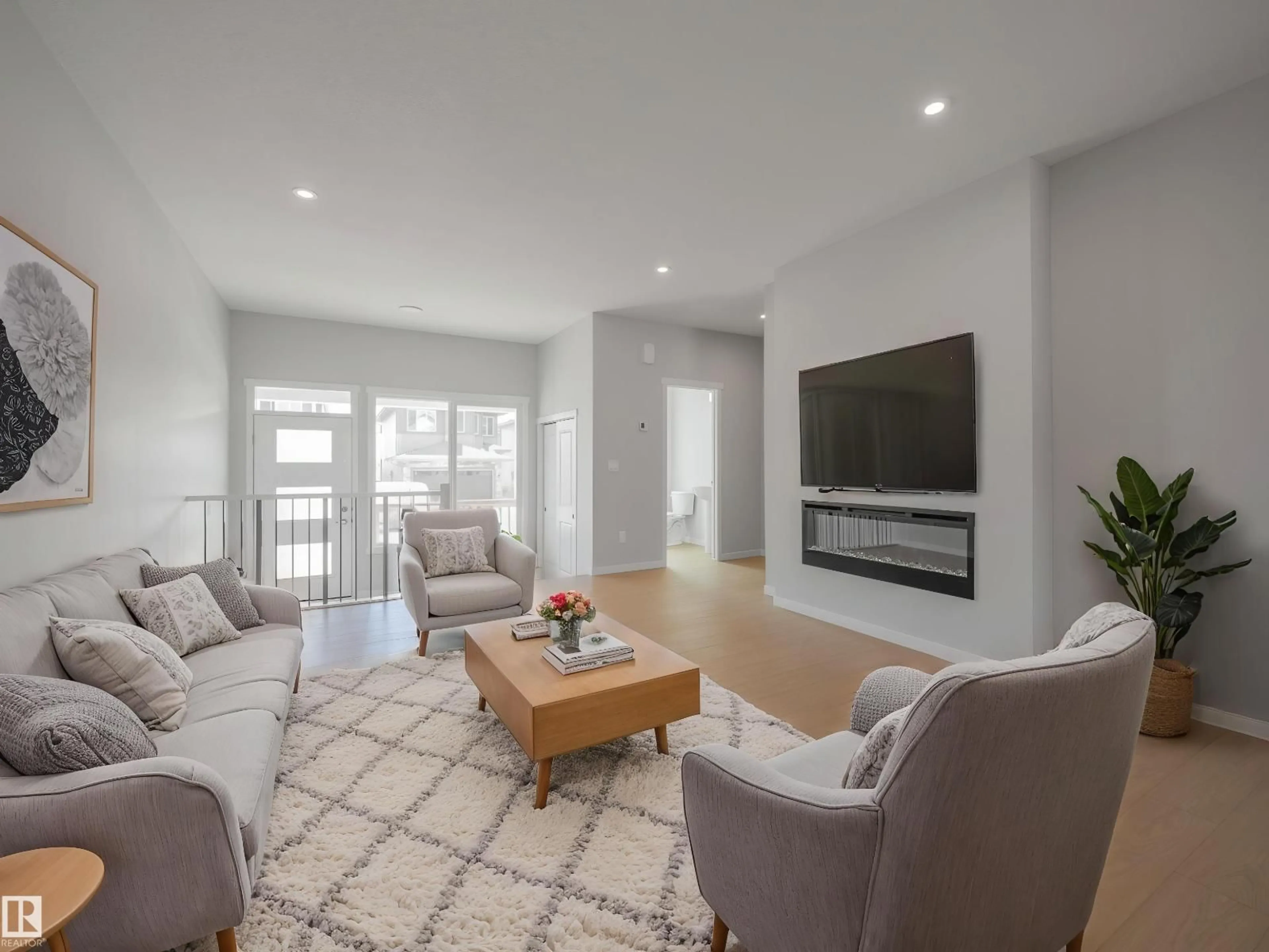 Living room with furniture, unknown for NE - 17338 6 A ST, Edmonton Alberta T5Z0A1