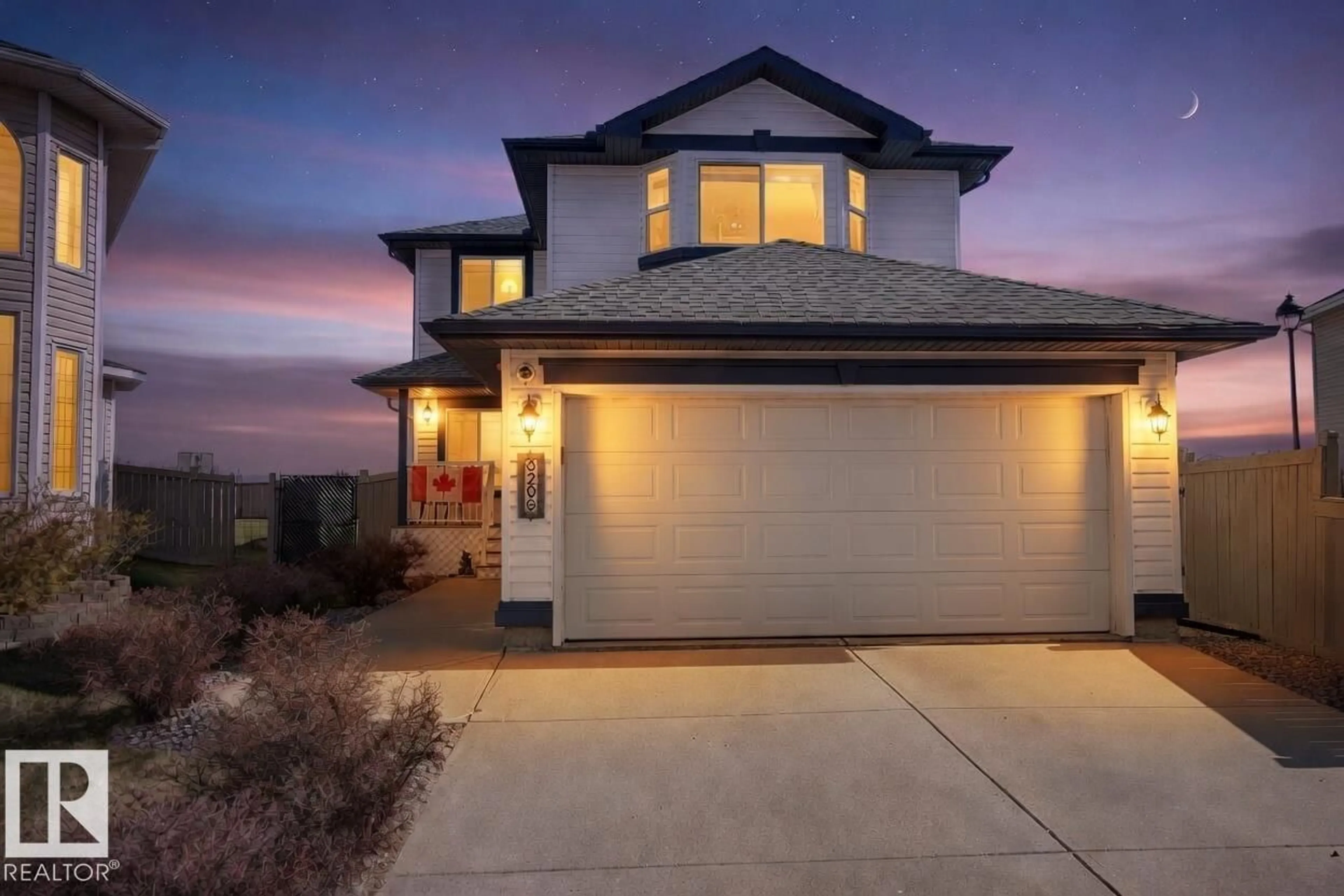 Home with vinyl exterior material, street for NW - 3203 23 ST, Edmonton Alberta T6T2A9