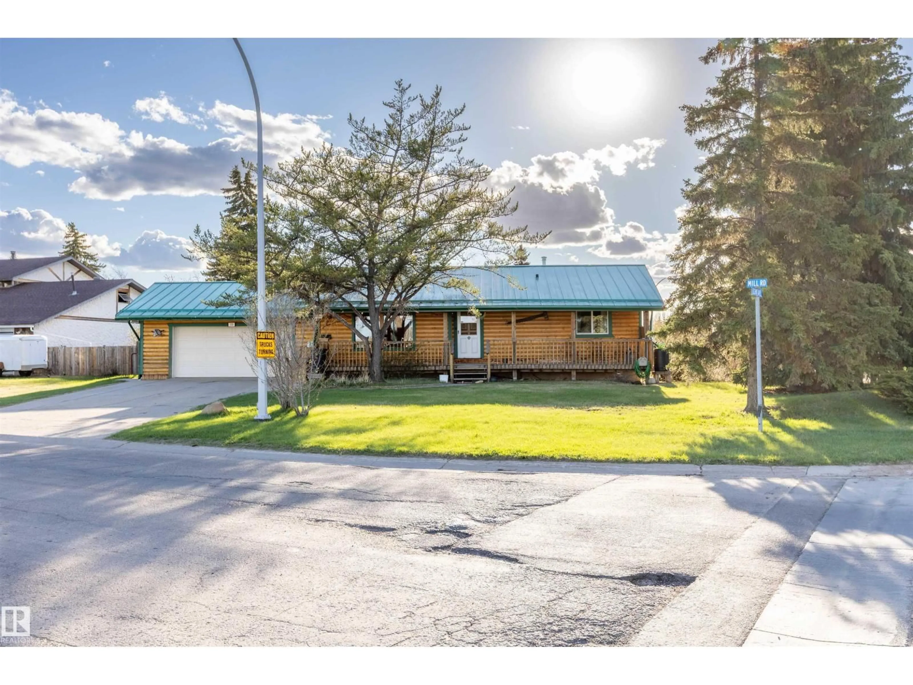 A pic from outside/outdoor area/front of a property/back of a property/a pic from drone, street for 100 MILL RD, Cardiff Alberta T8R1P2