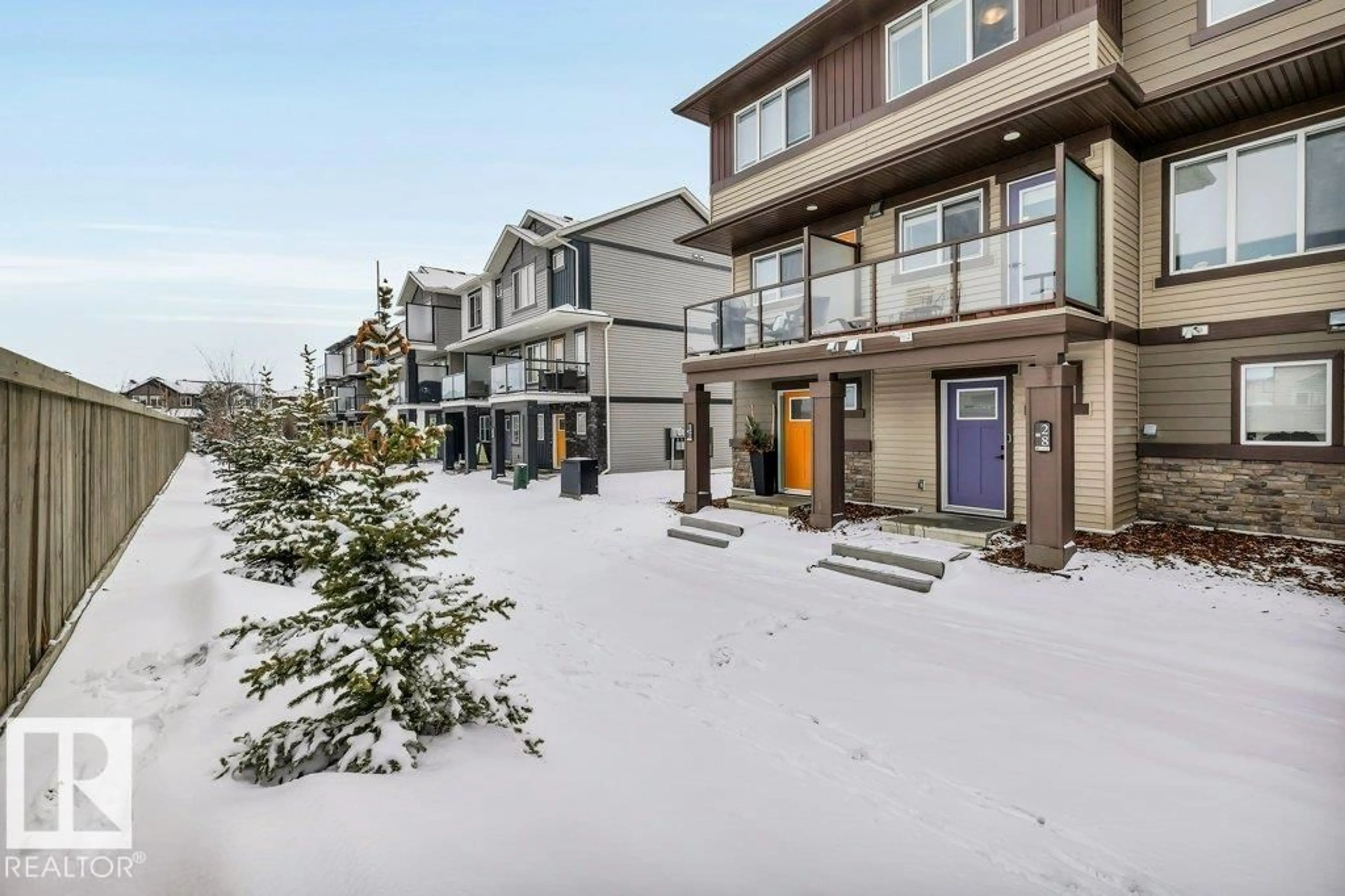 A pic from outside/outdoor area/front of a property/back of a property/a pic from drone, unknown for 1530 - 28 TAMARACK BV, Edmonton Alberta T6T2E6