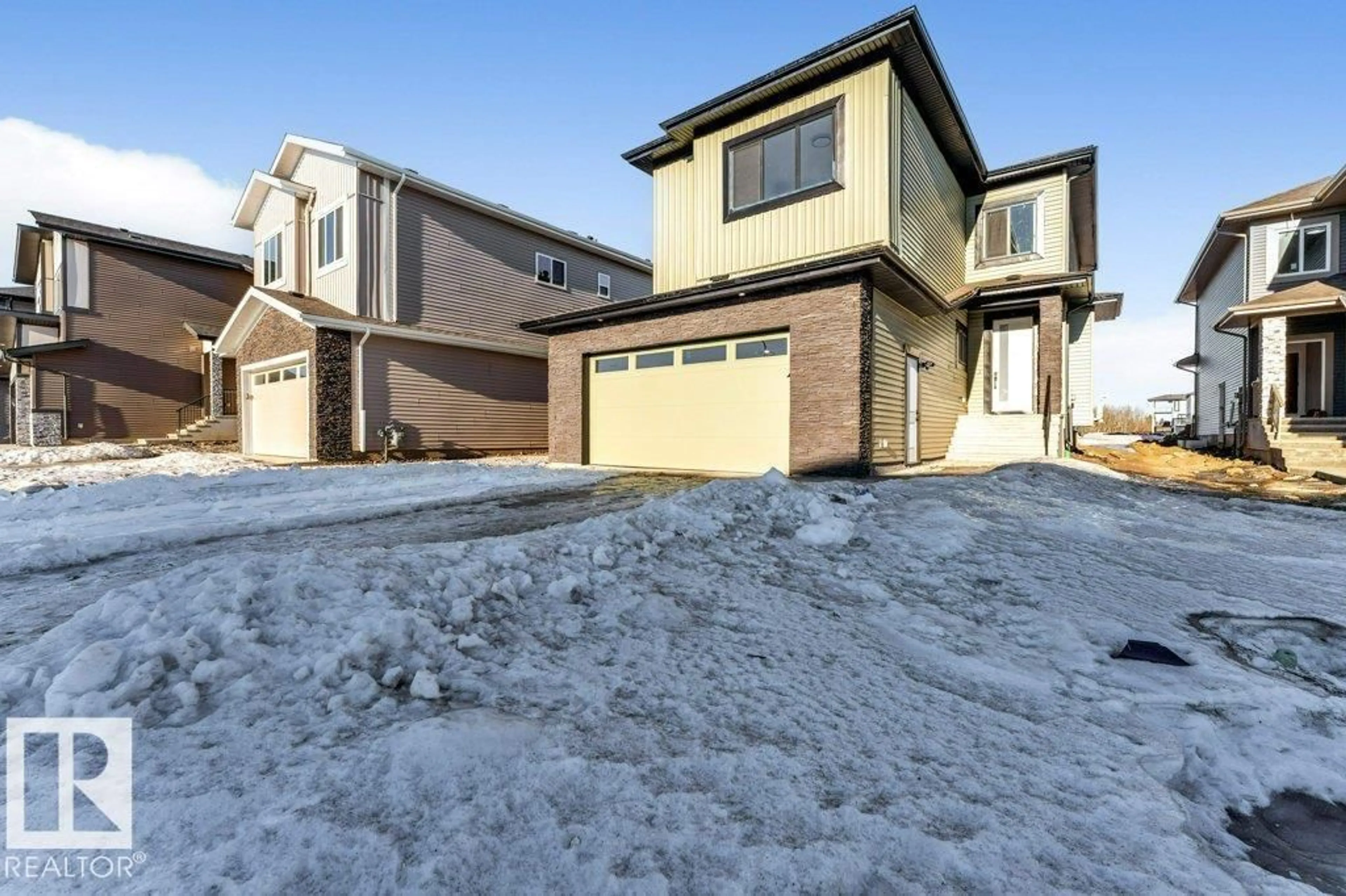 A pic from outside/outdoor area/front of a property/back of a property/a pic from drone, street for 2408 63 AV, Rural Leduc County Alberta T4X0K5