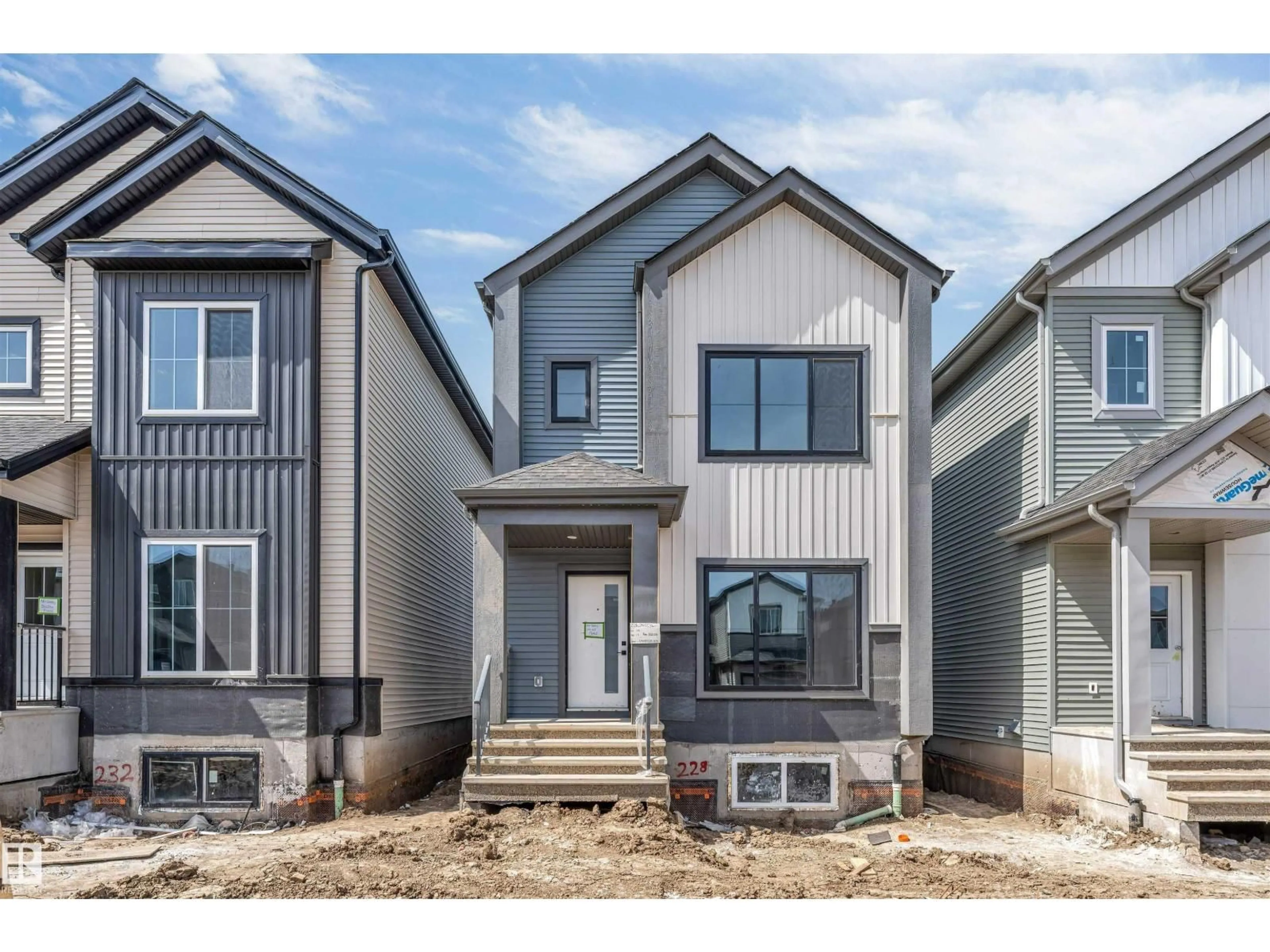 Home with vinyl exterior material, street for SW - 228 24 ST, Edmonton Alberta T6X3K4