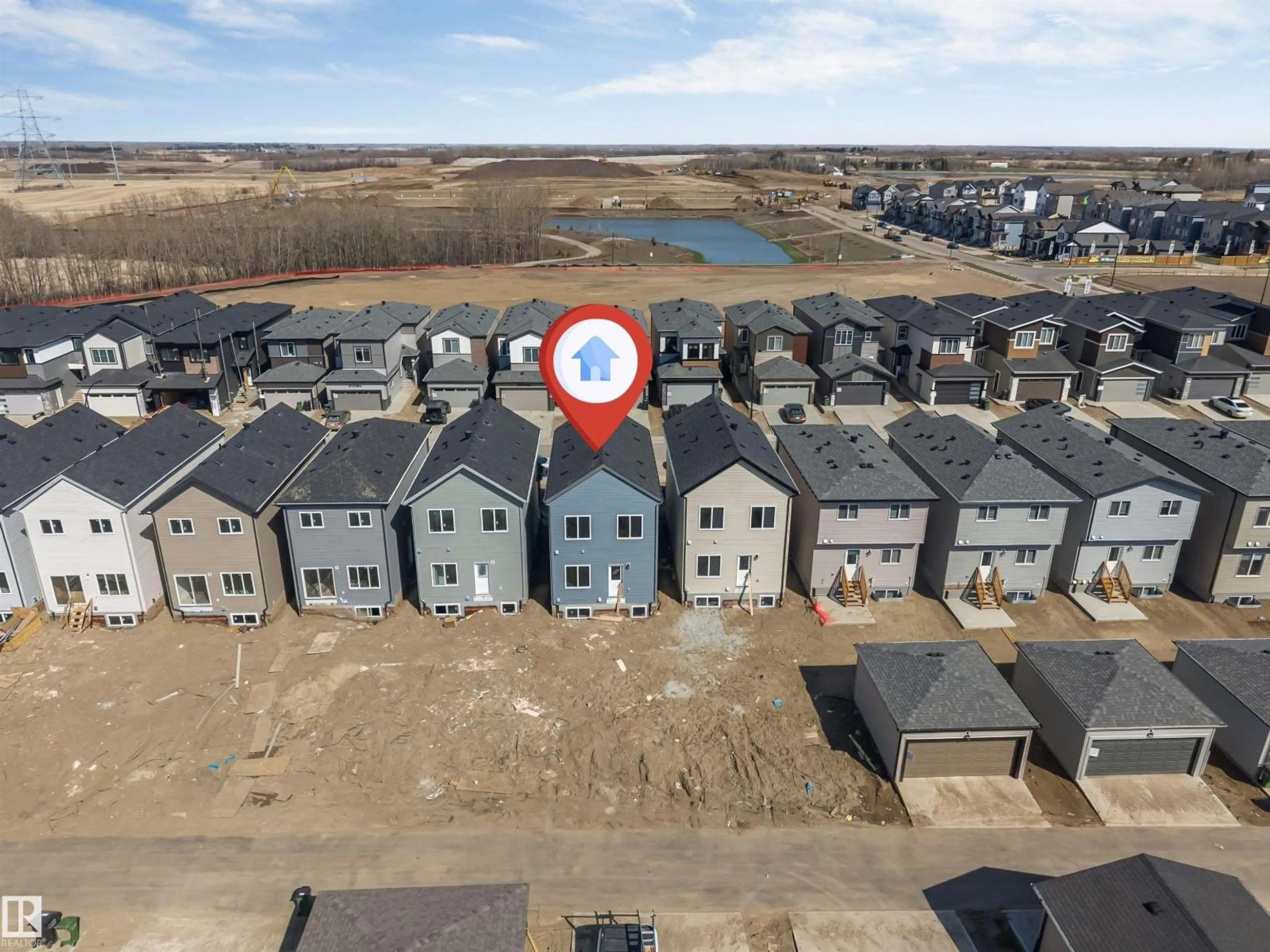A pic from outside/outdoor area/front of a property/back of a property/a pic from drone, water/lake/river/ocean view for SW - 228 24 ST, Edmonton Alberta T6X3K4