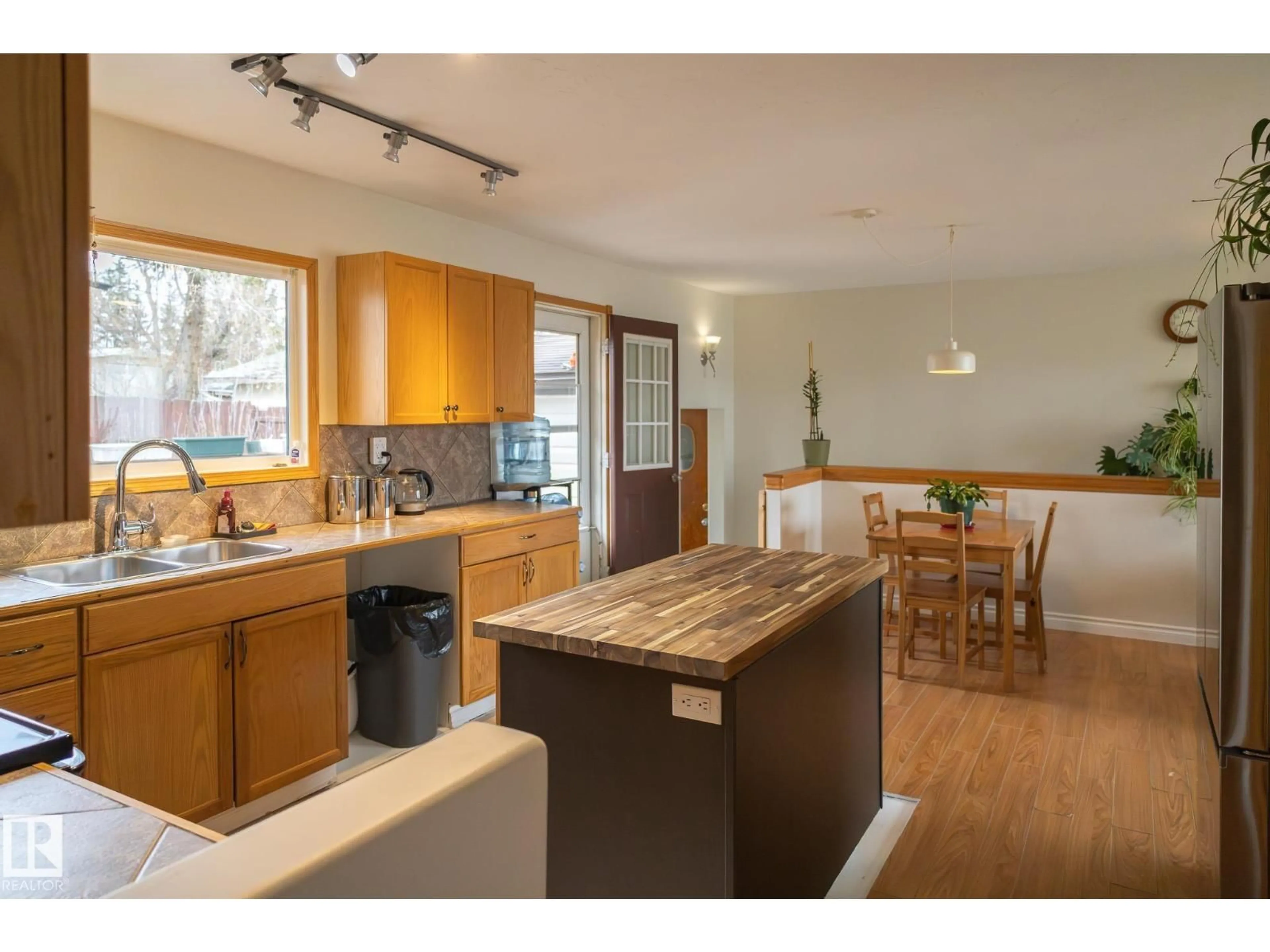 Open concept kitchen, wood/laminate floor for 5132 49 AV, Onoway Alberta T0E1V0