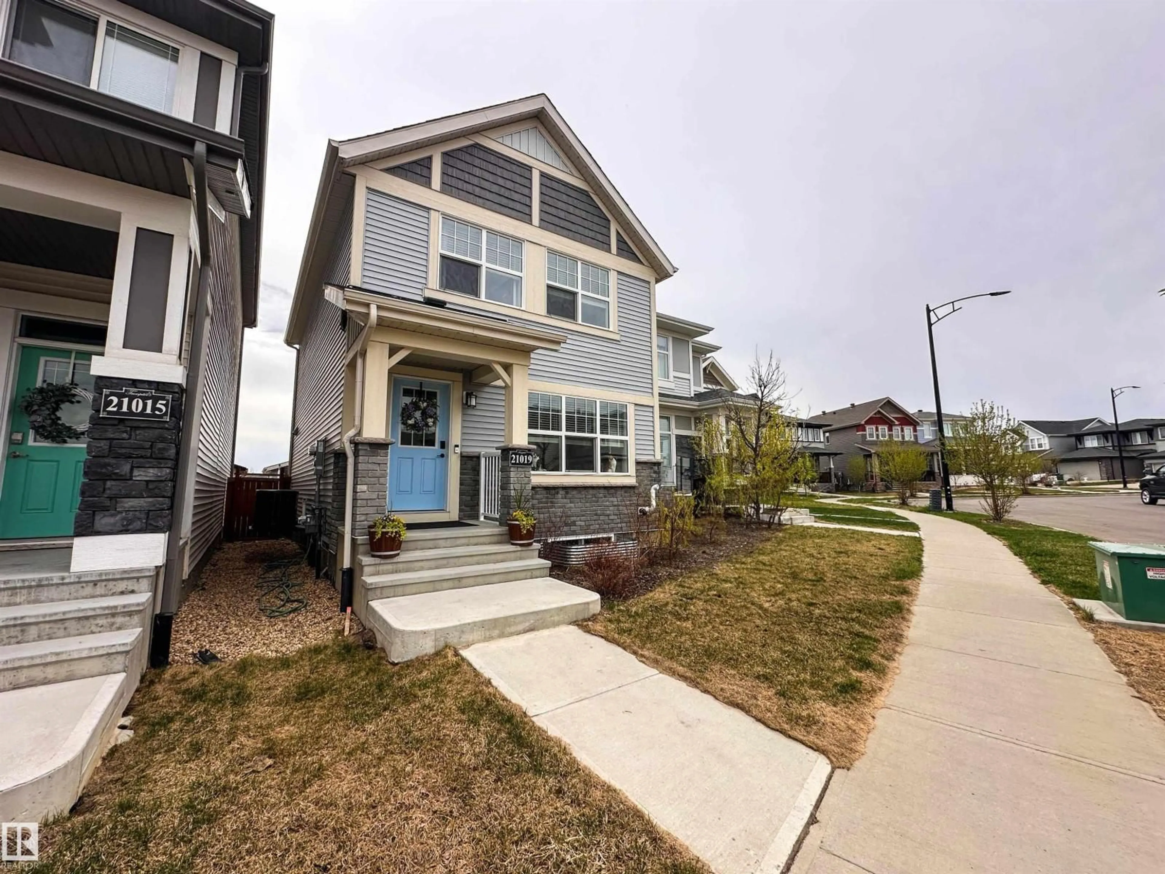 Home with vinyl exterior material, street for 21019 130 AV, Edmonton Alberta T5S0N6