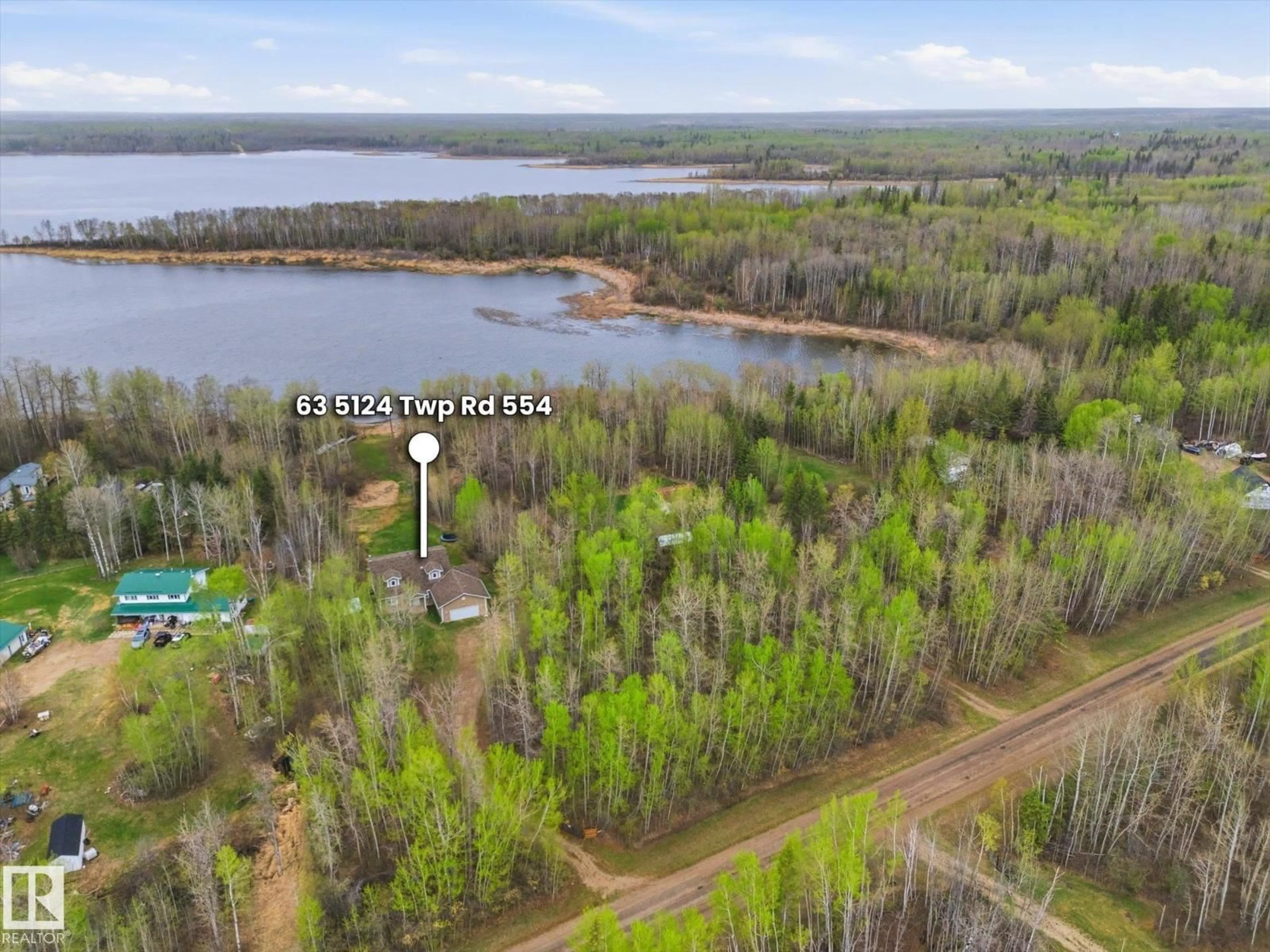 A pic from outside/outdoor area/front of a property/back of a property/a pic from drone, water/lake/river/ocean view for 5124 - 63 TWP ROAD 554, Rural Lac Ste. Anne County Alberta T0E0J0