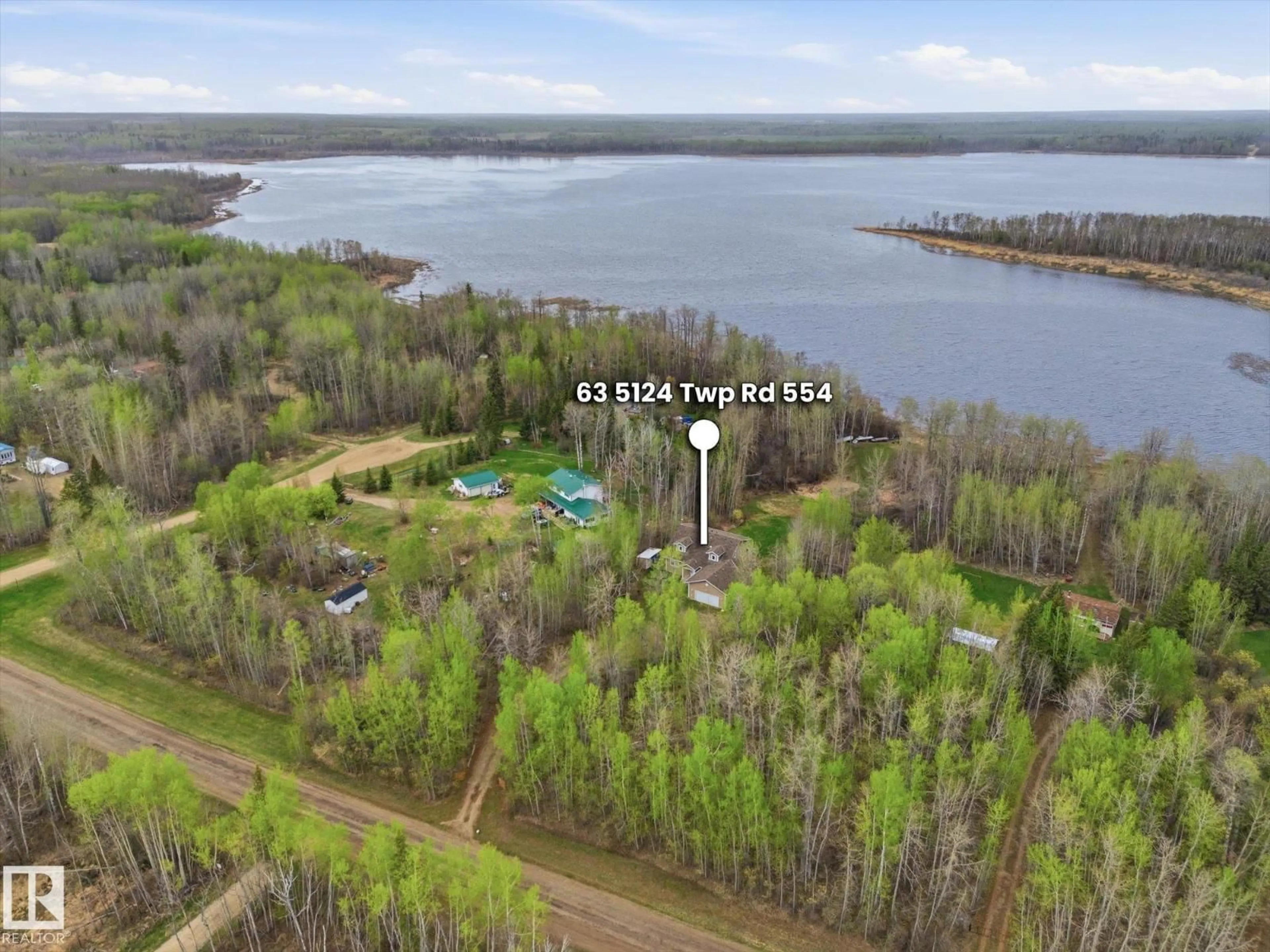 A pic from outside/outdoor area/front of a property/back of a property/a pic from drone, water/lake/river/ocean view for 5124 - 63 TWP ROAD 554, Rural Lac Ste. Anne County Alberta T0E0J0
