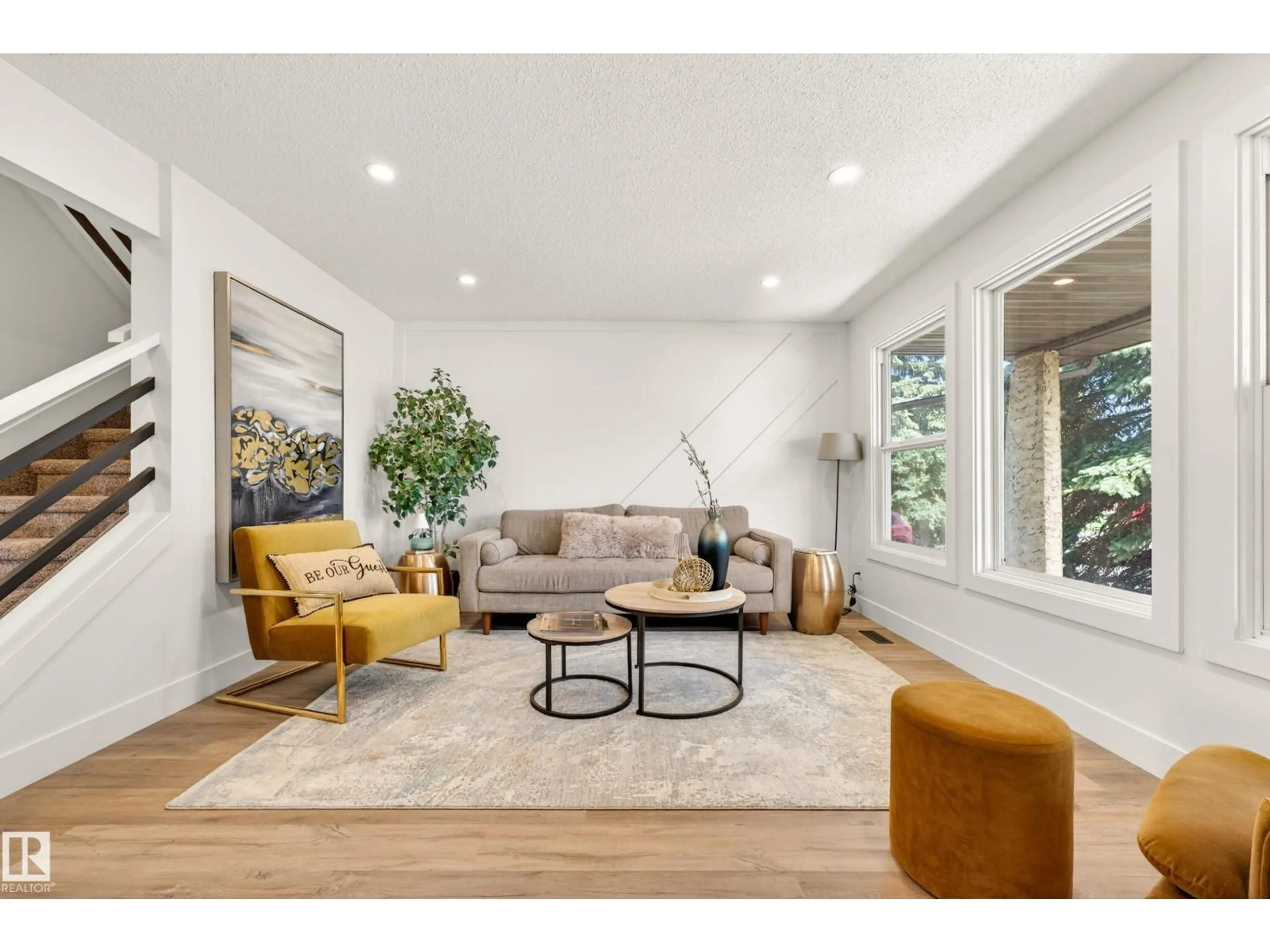 Living room with furniture, wood/laminate floor for 17312 108 ST, Edmonton Alberta T5X3Y8