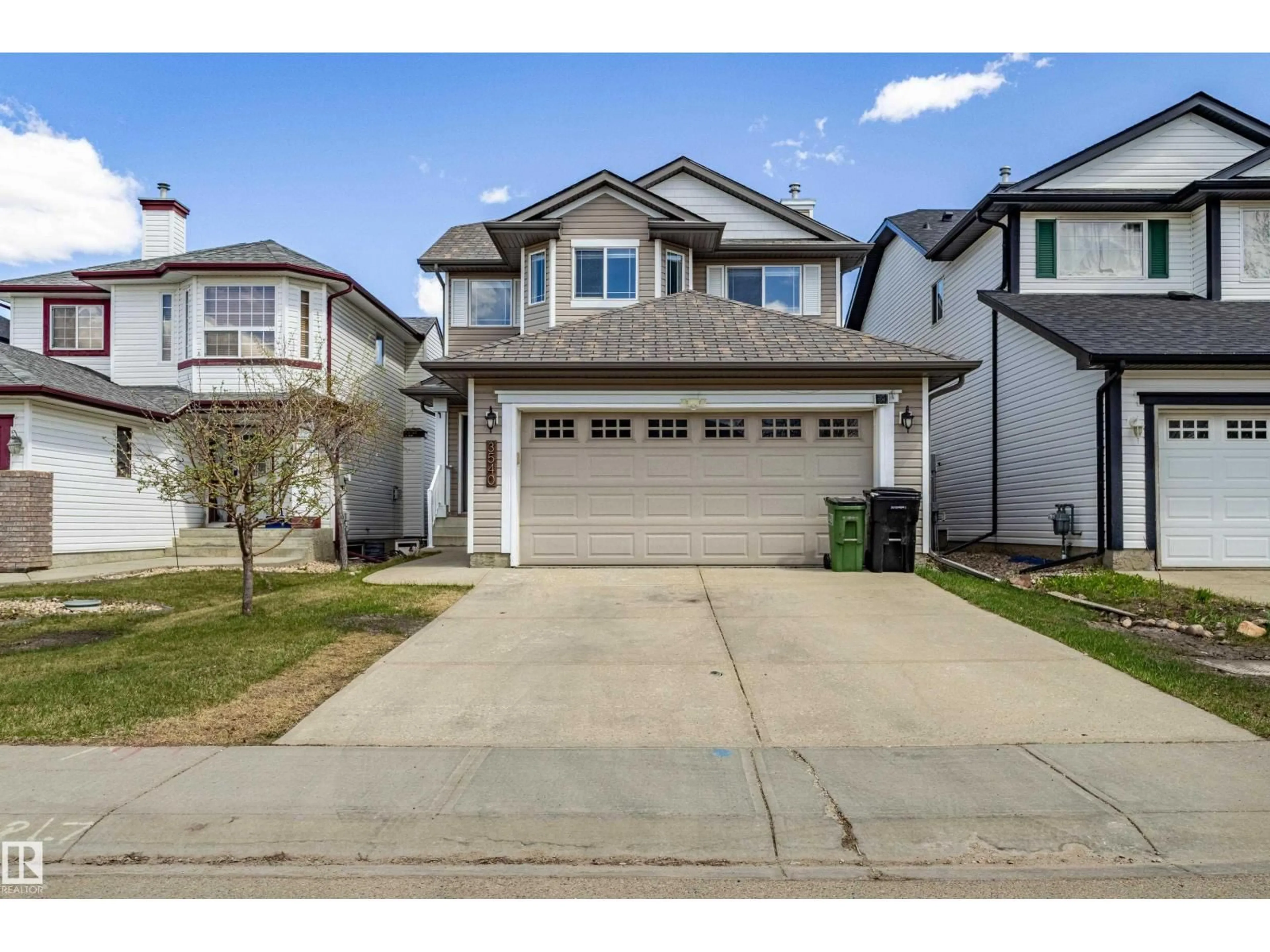 Home with vinyl exterior material, street for 3540 MCLEAN CR, Edmonton Alberta T6W1M3