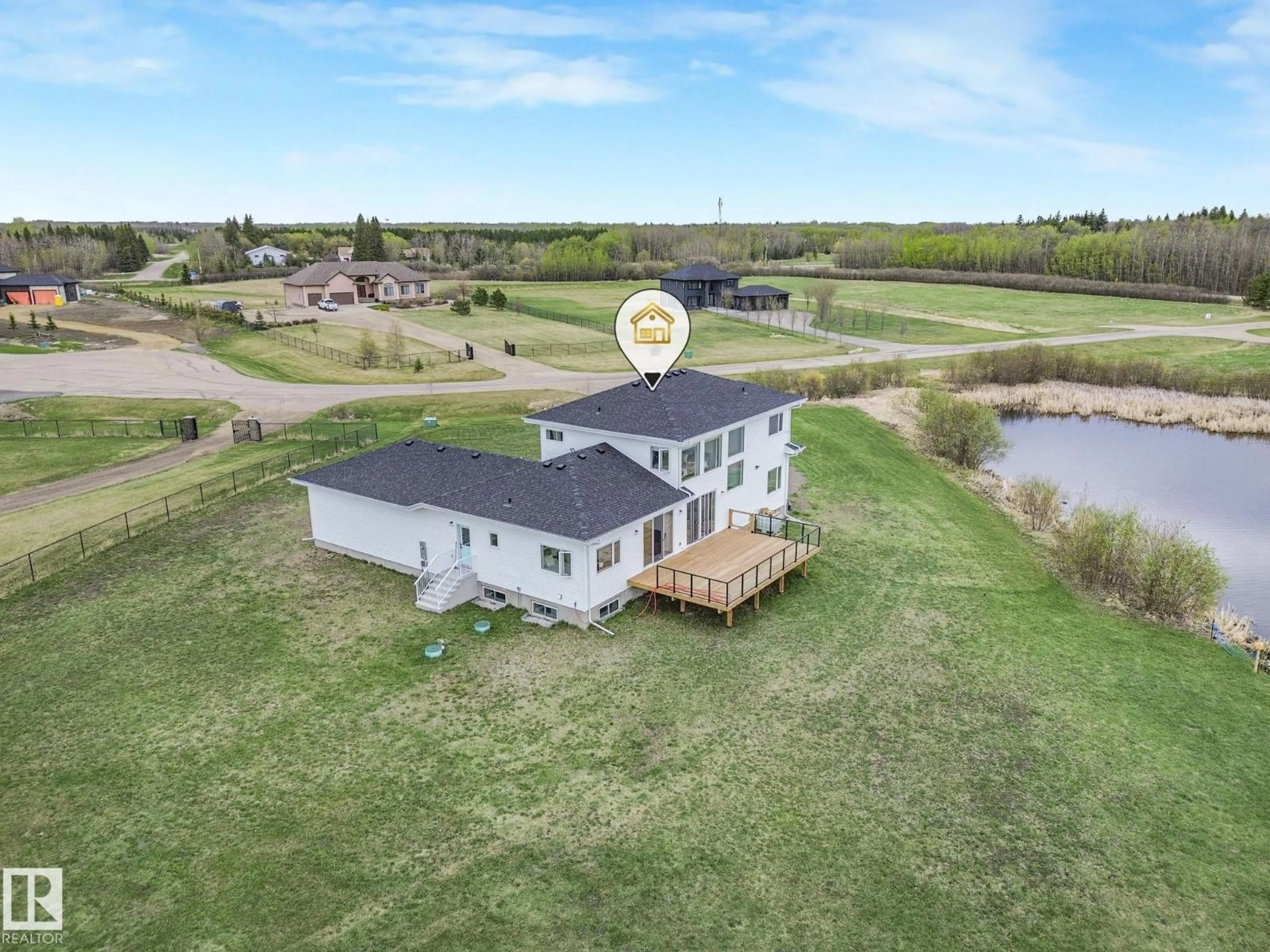 A pic from outside/outdoor area/front of a property/back of a property/a pic from drone, building for 60 23412 TWP RD 505, Rural Leduc County Alberta T4X0S1