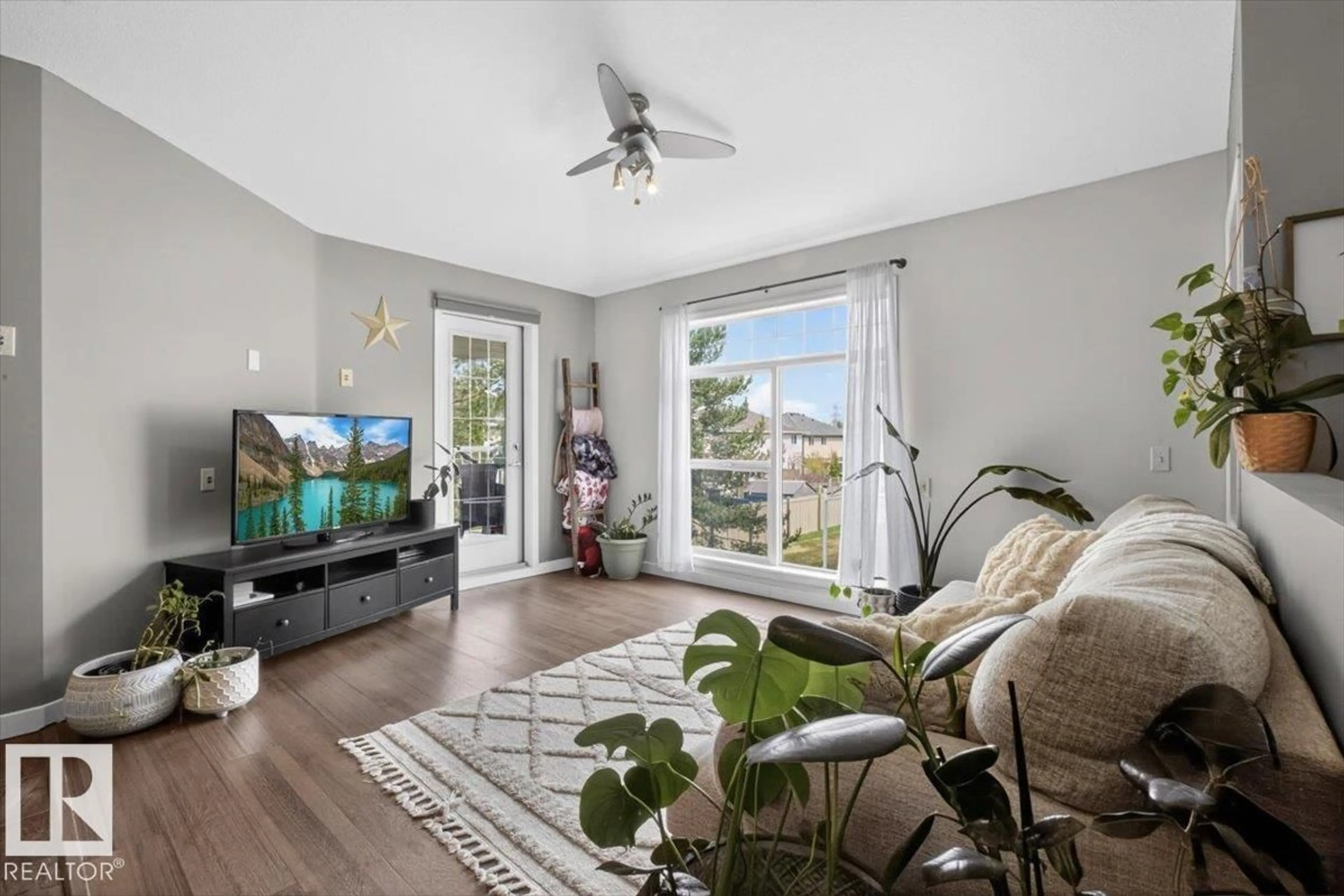 Living room with furniture, unknown for #50 - 150 EDWARDS DR, Edmonton Alberta T6X1M2