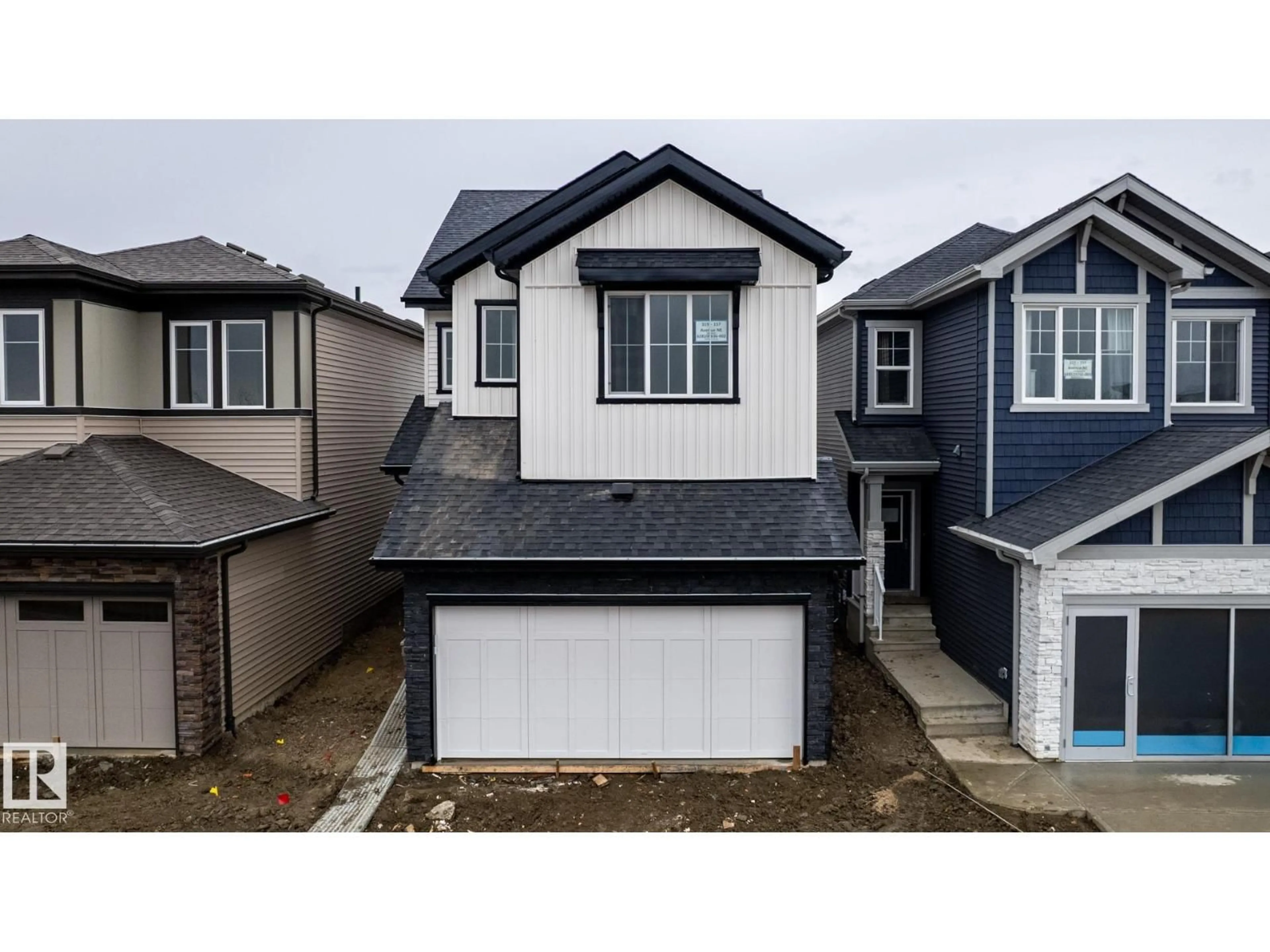 A pic from outside/outdoor area/front of a property/back of a property/a pic from drone, street for NE - 319 157 AV, Edmonton Alberta T5K6K8