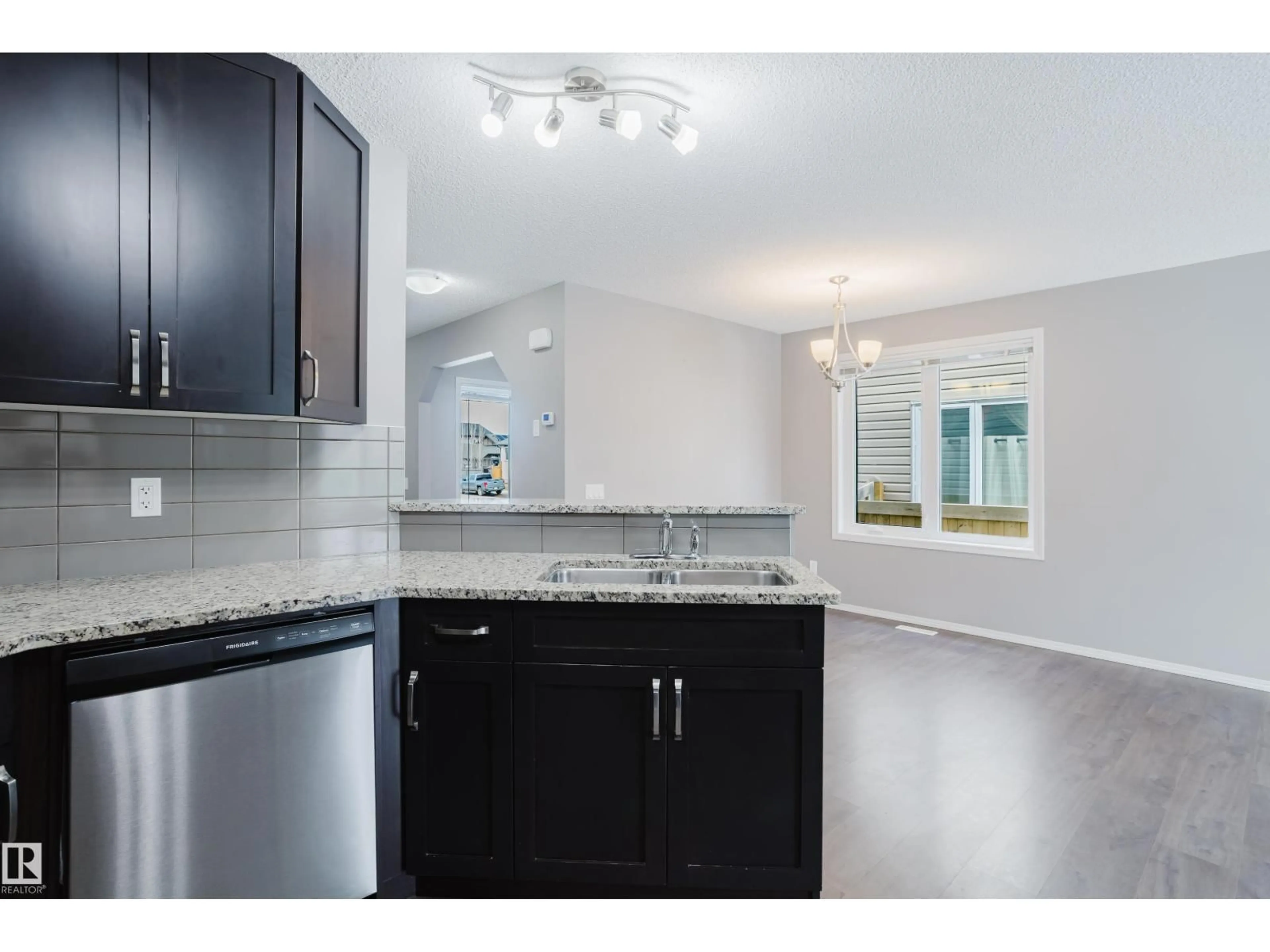 Open concept kitchen, ceramic/tile floor for 14007 164 AV, Edmonton Alberta T6V0K6