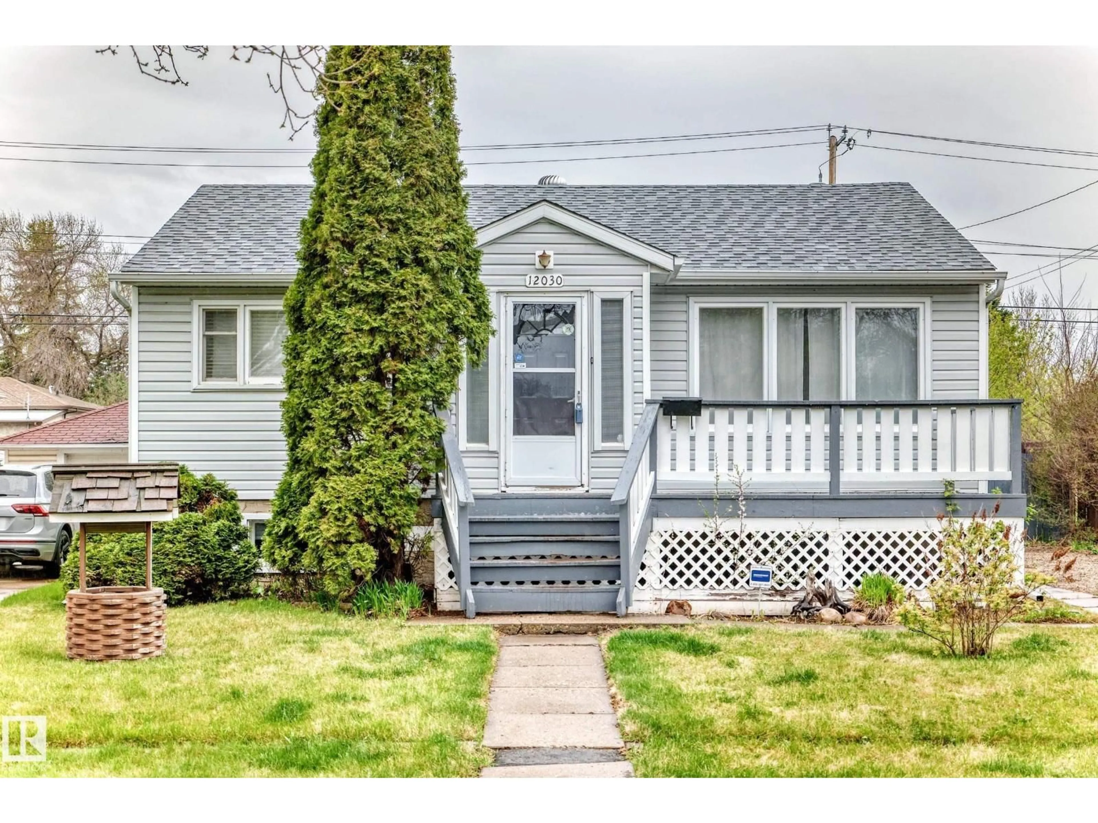 Home with vinyl exterior material, street for NW - 12030 48 ST, Edmonton Alberta T5W2Y8