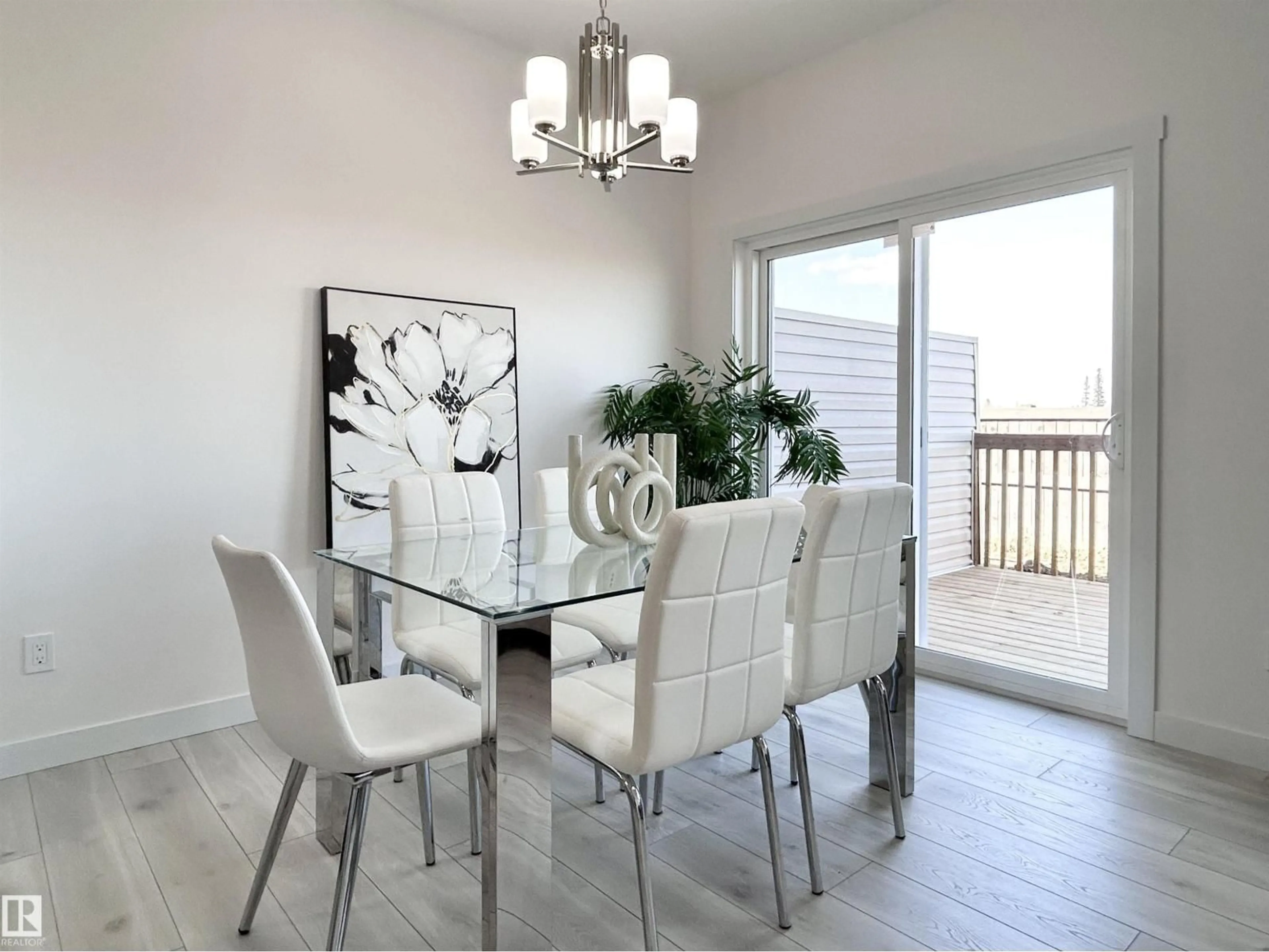 Dining room, wood/laminate floor for NW - 19632 29 AV, Edmonton Alberta T6M1M2