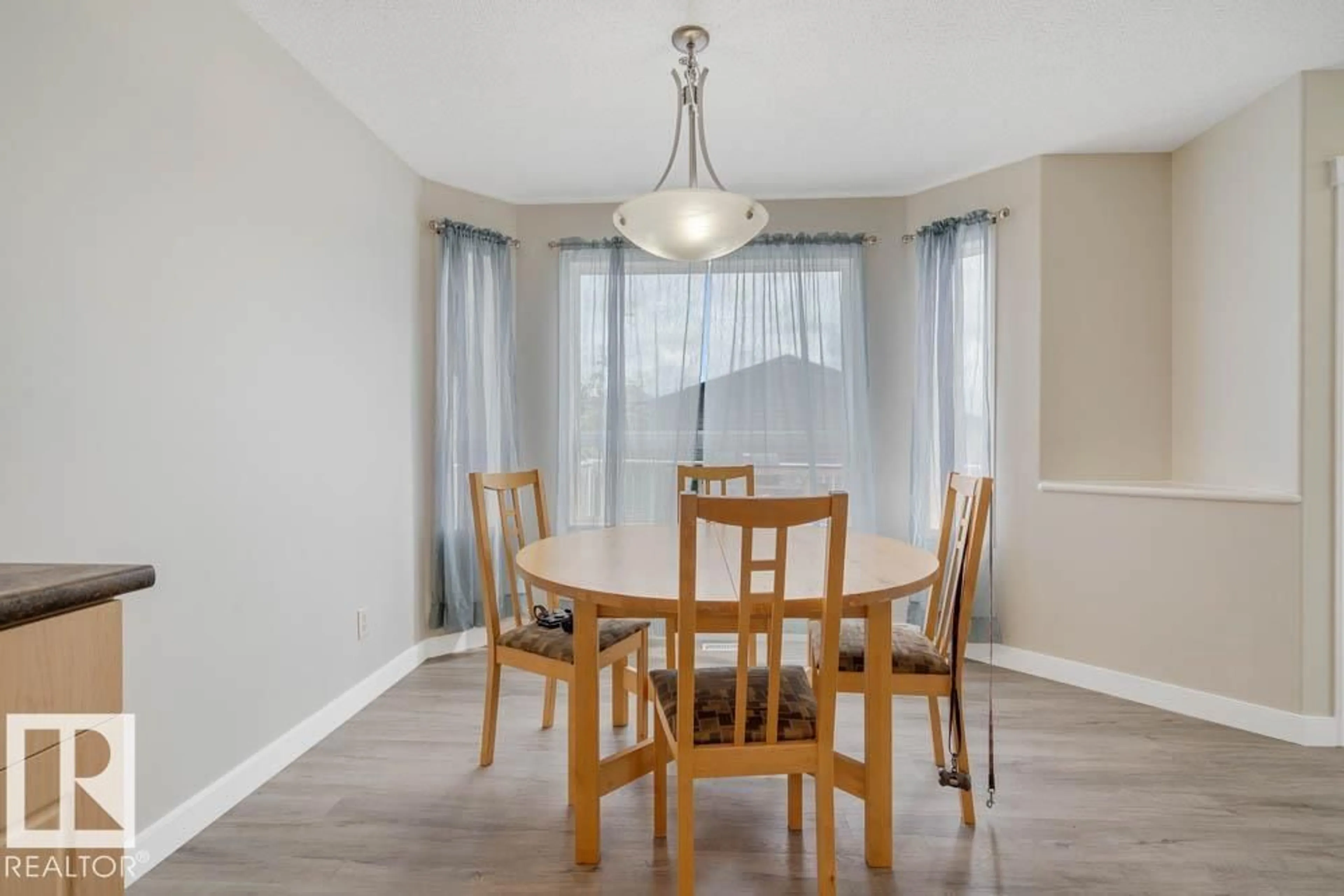 Dining room, wood/laminate floor for PM - 57 SUNTREE, Leduc Alberta T9E8R8