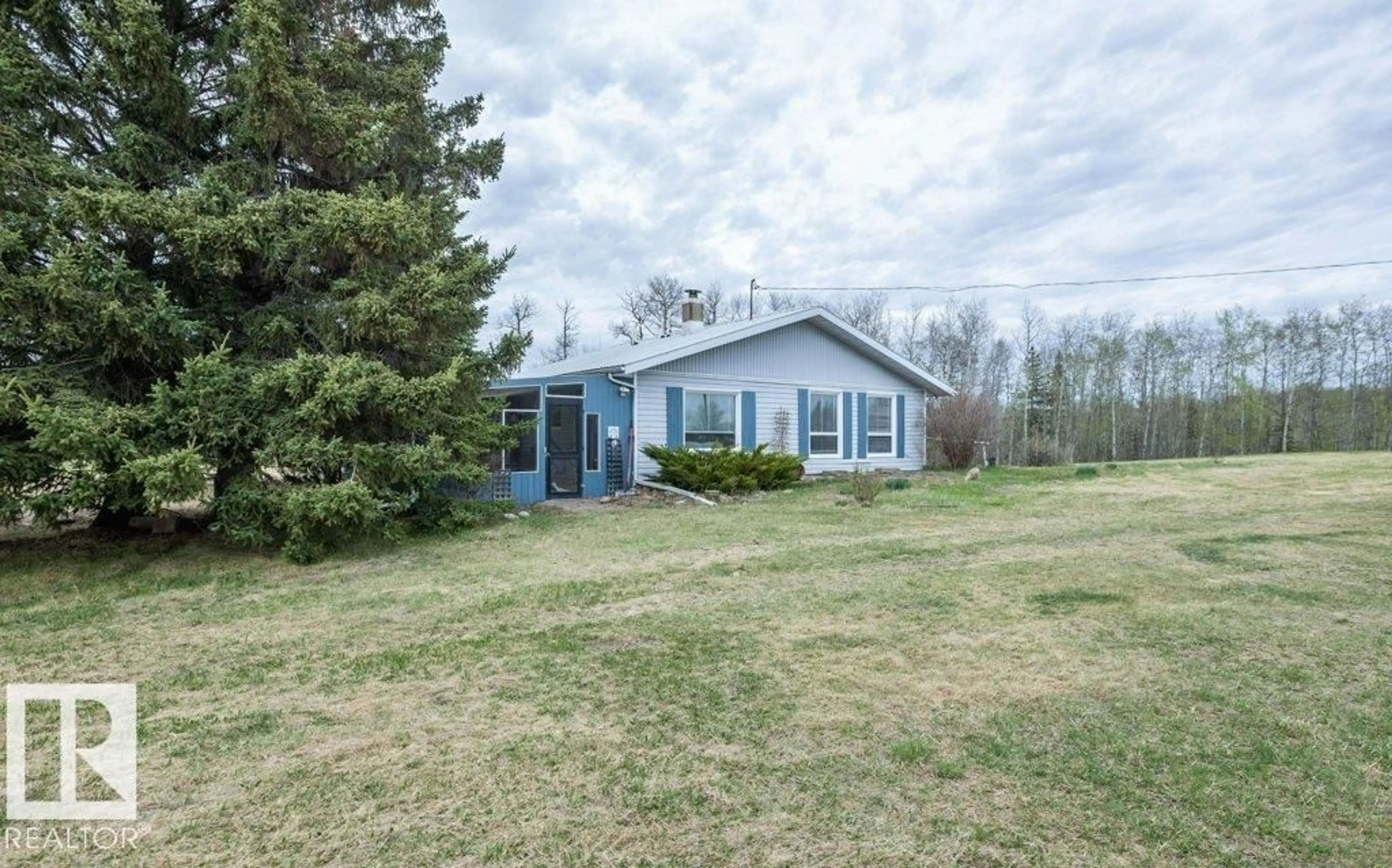 A pic from outside/outdoor area/front of a property/back of a property/a pic from drone, water/lake/river/ocean view for 58020 RG RD 274, Rural Westlock County Alberta T0G0H0