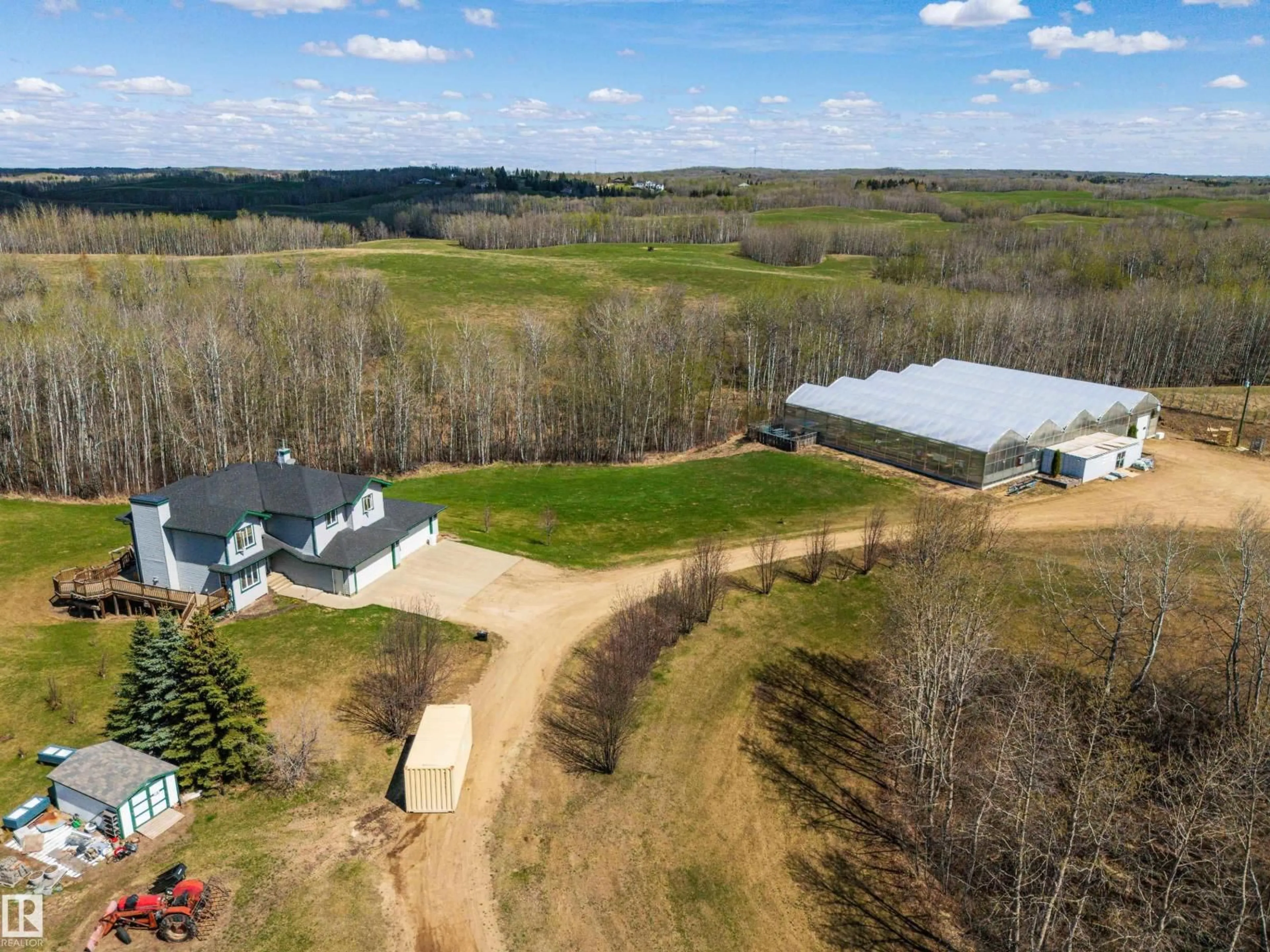 A pic from outside/outdoor area/front of a property/back of a property/a pic from drone, unknown for 1130 TWP ROAD 535, Rural Parkland County Alberta T7Z1X3