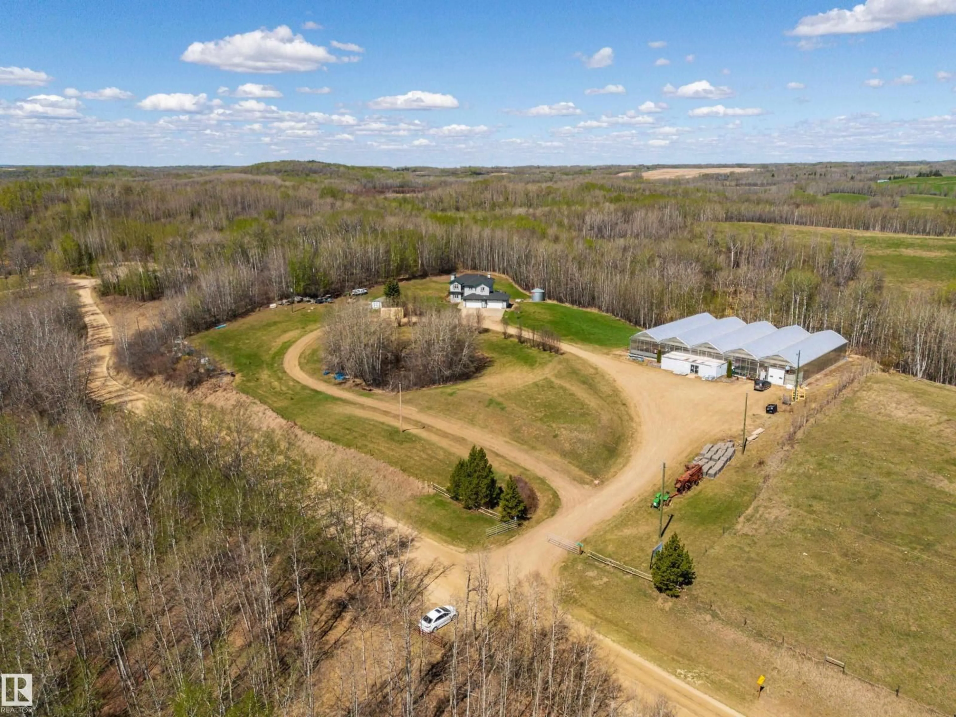 A pic from outside/outdoor area/front of a property/back of a property/a pic from drone, unknown for 1130 TWP ROAD 535, Rural Parkland County Alberta T7Z1X3