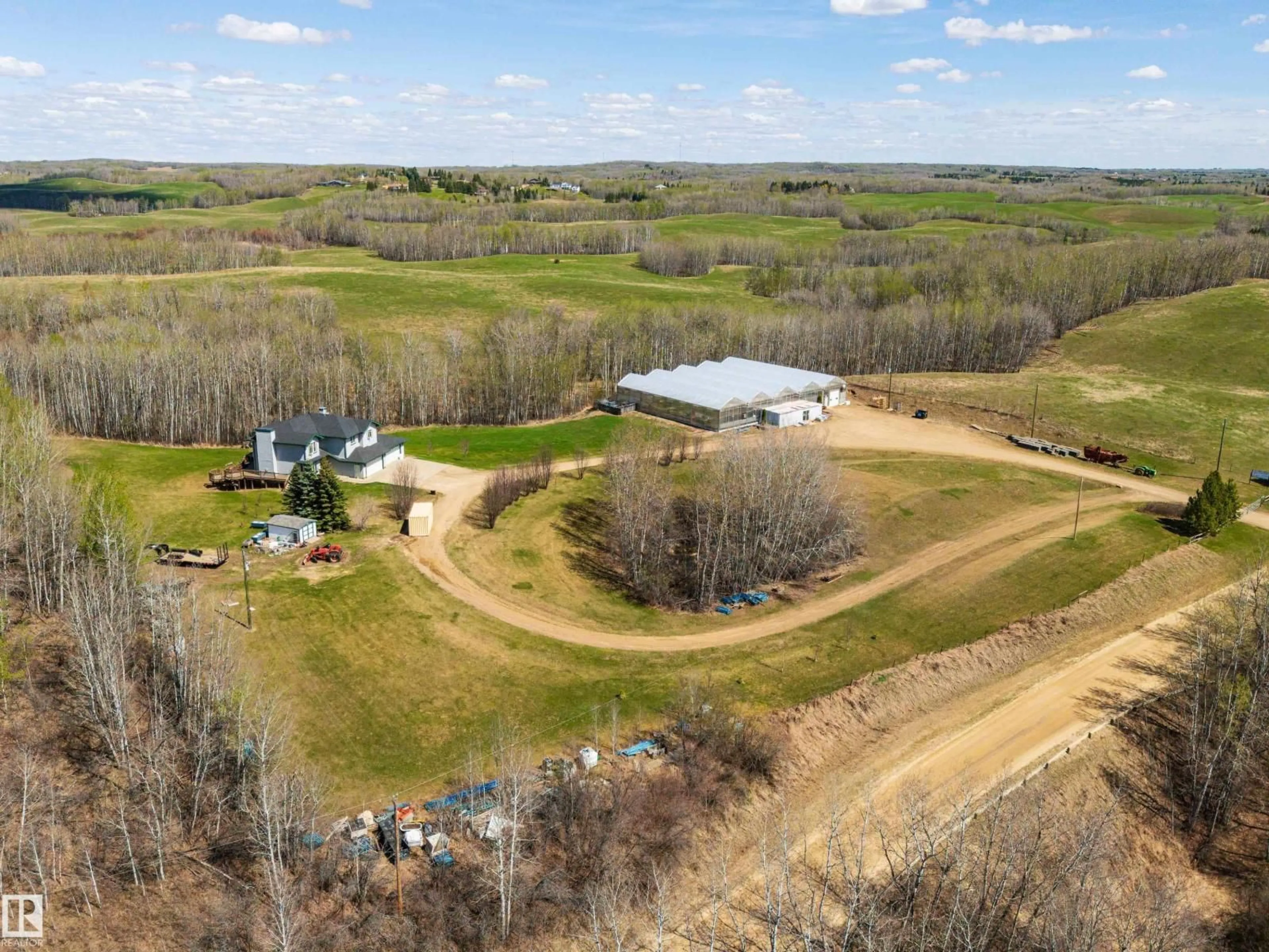 A pic from outside/outdoor area/front of a property/back of a property/a pic from drone, unknown for 1130 TWP ROAD 535, Rural Parkland County Alberta T7Z1X3