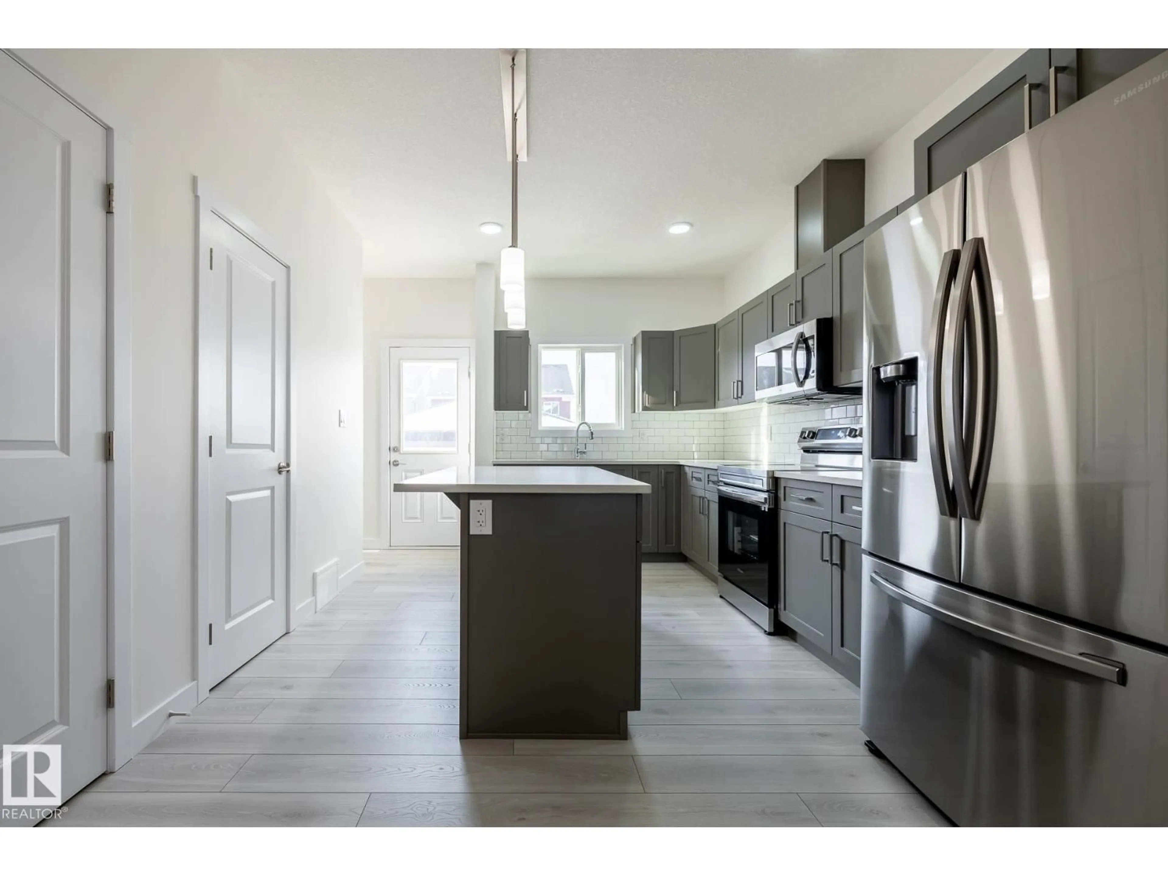 Open concept kitchen, unknown for 3 WORWYCK CM, Spruce Grove Alberta T7X4E1