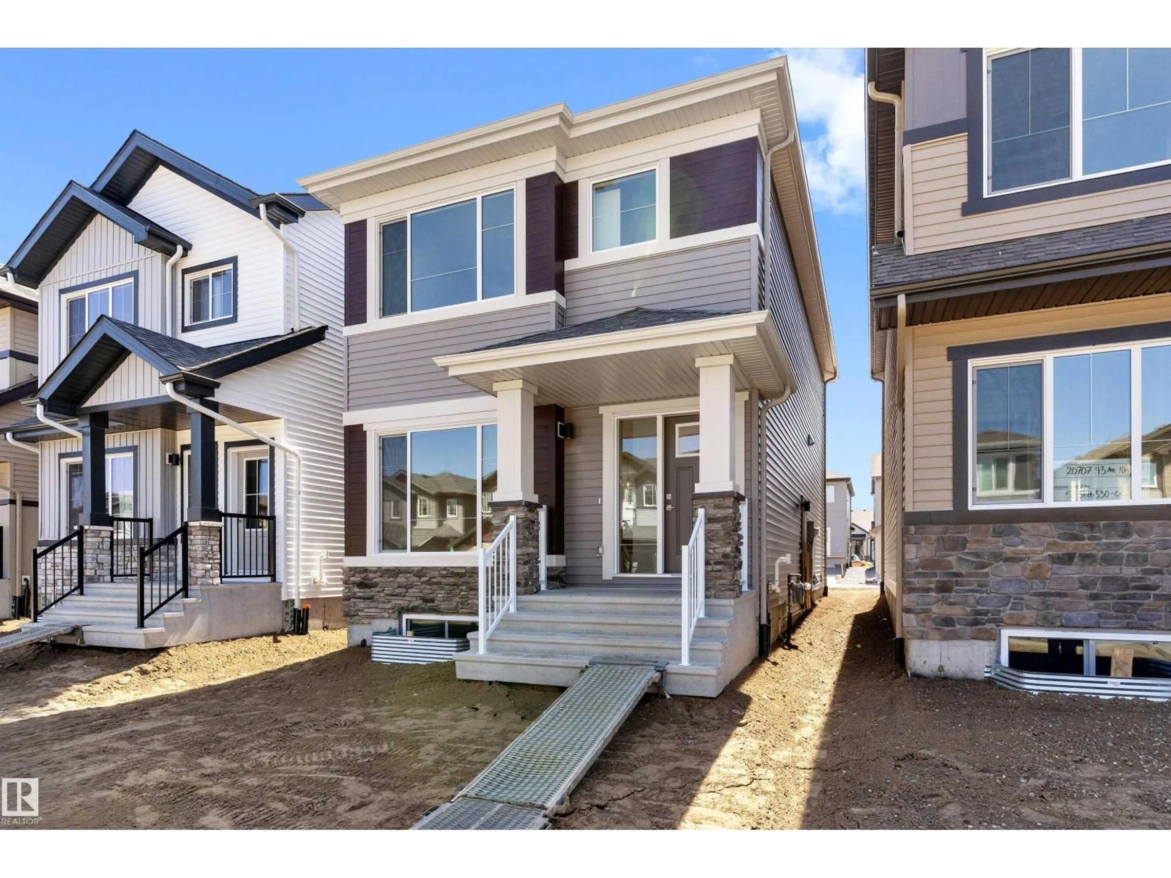 Home with vinyl exterior material, street for 20703 43 AV, Edmonton Alberta T6M3E3